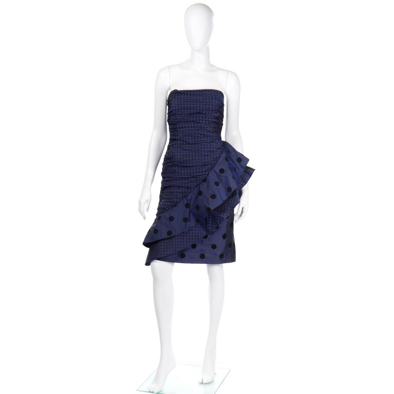 This is a show stopping vintage navy silk taffeta mini dress designed by Louis Feraud in the 1980s. We love vintage Louis Feraud and this dress is one that you can really only appreciate in person, as the photos can't capture the texture or beauty