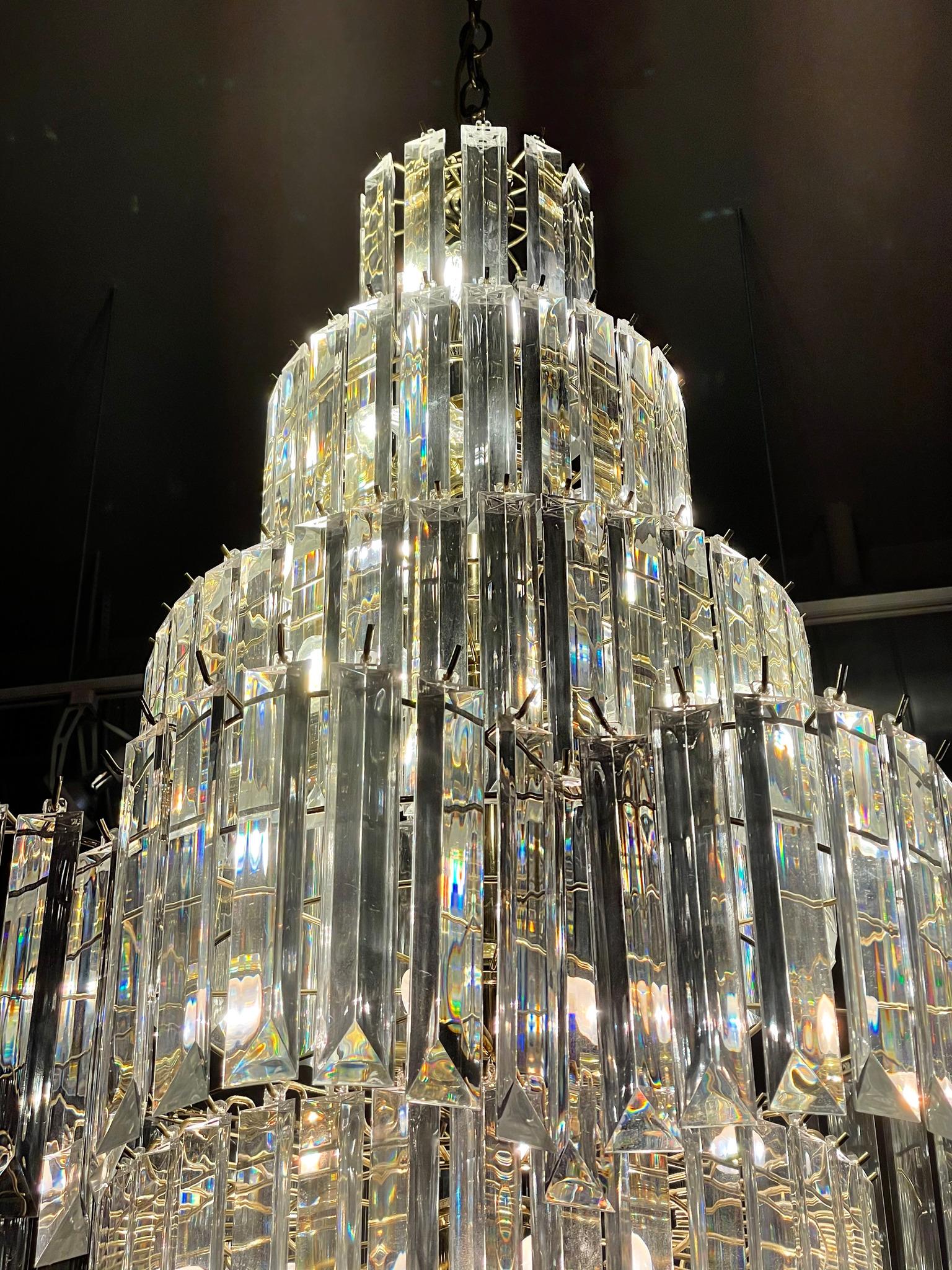Gorgeous and enormous Lucite chandelier with 7 tiers. Excellent for an entry way or any space with high ceiling.

Dimensions: 24