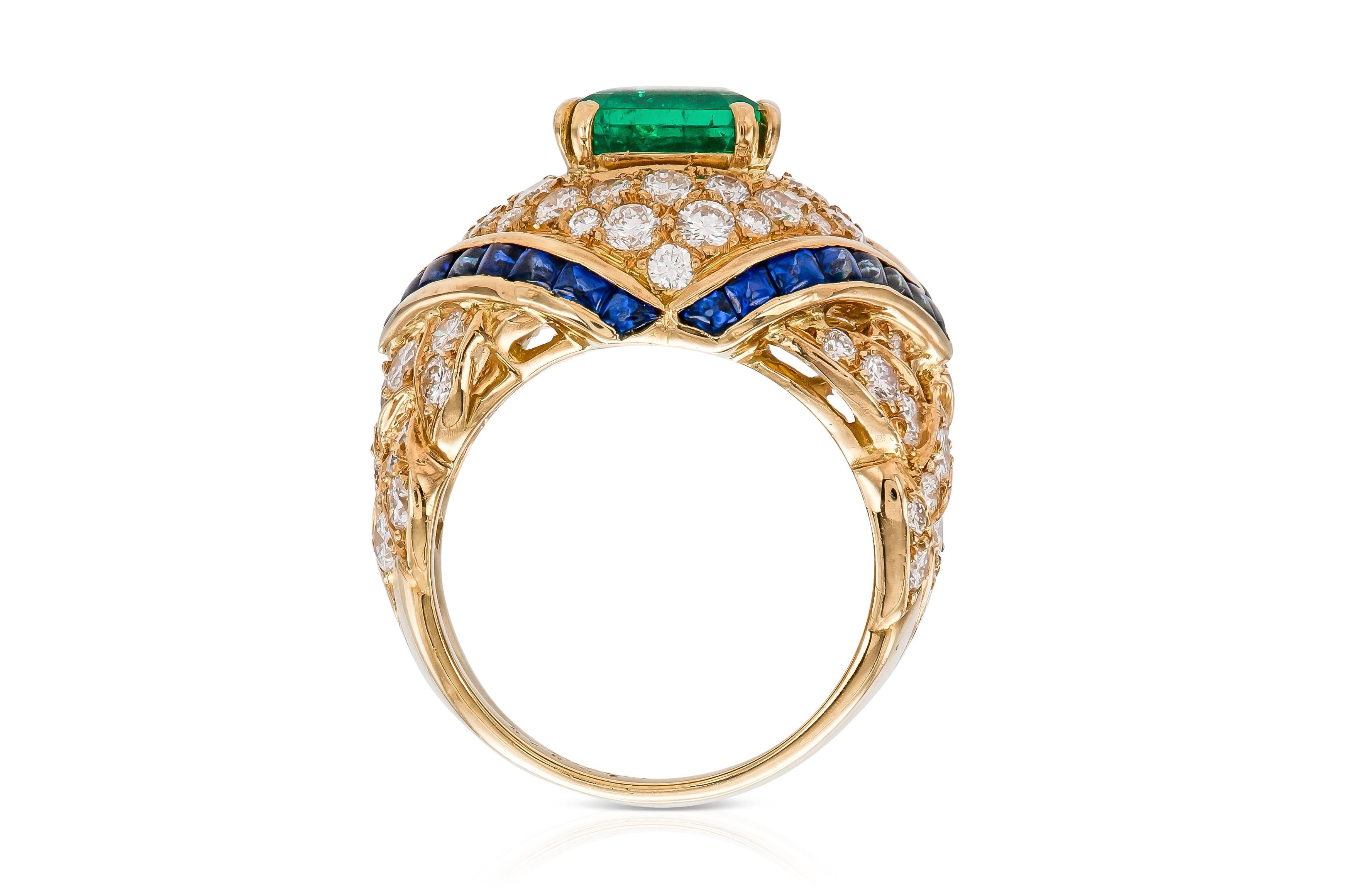 Vintage 1980s Mauboussin Emerald Ring with Diamonds and Sapphires In Good Condition For Sale In New York, NY