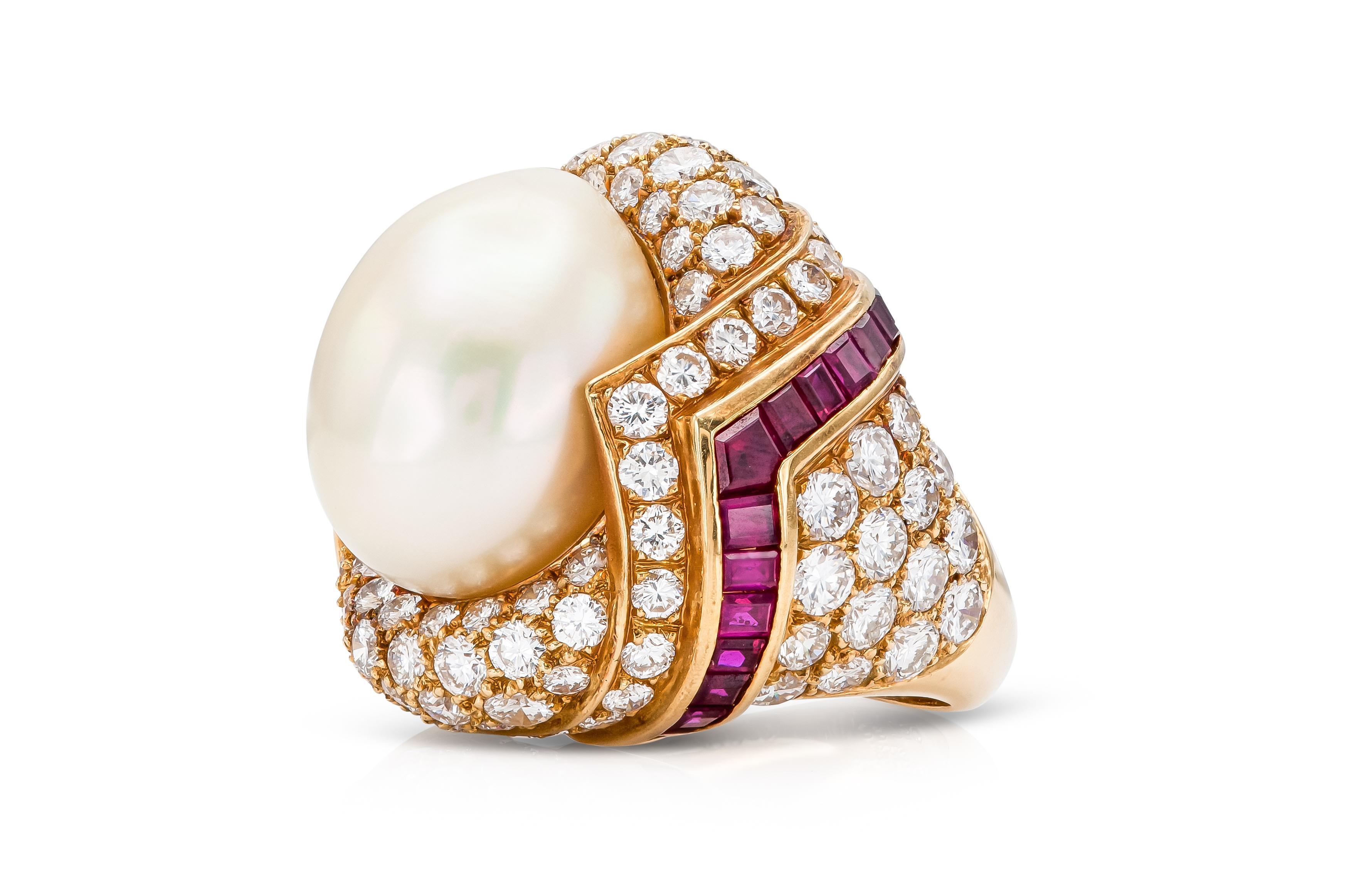 Finely crafted in 18k yellow gold with a GIA certified Oval South Sea Pearl measuring 18.50 x 13.88mm. The ring features Round Brilliant cut Diamonds weighing approximately a total of 8.00 carats and Square cut Rubies.
Signed by Mauboussin
Size 6