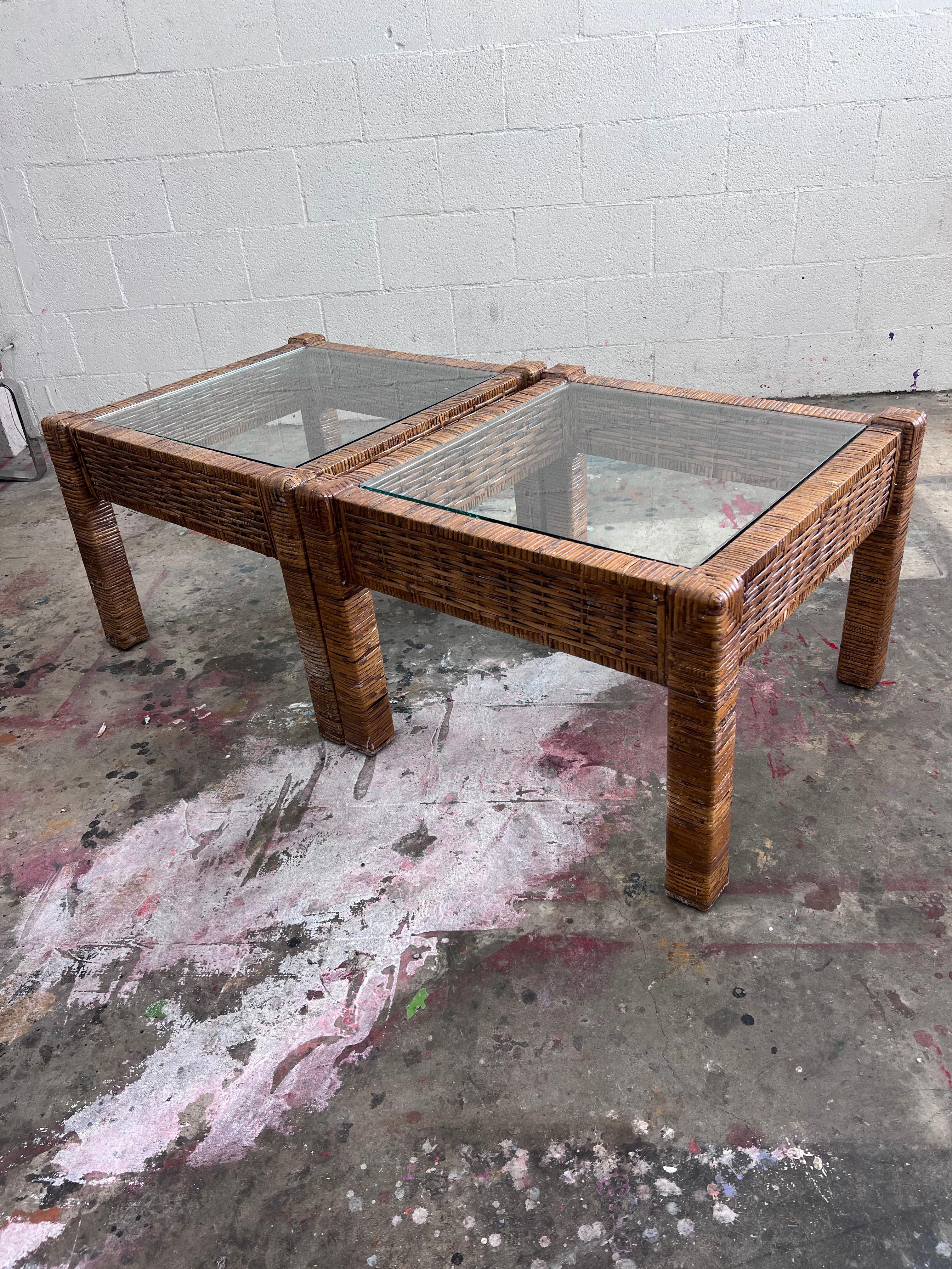 Vintage rattan side or end tables or small coffee table with glass tops. 


A smaller version of these are also available. 