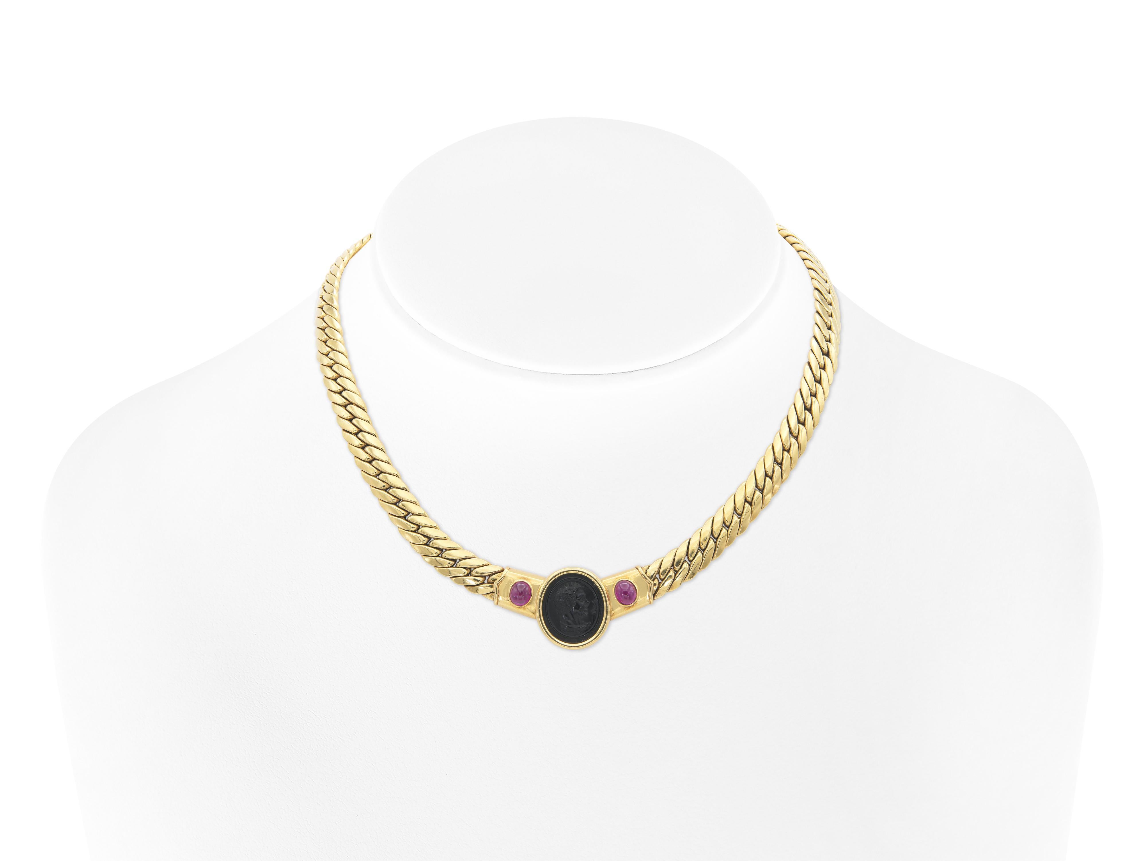 Finely crafted in 18k yellow gold with an Onyx Cameo and 2 Cabochon Rubies weighing approximately a total of 1.50 carat.
Made in Italy
Circa 1980s
17 inches long