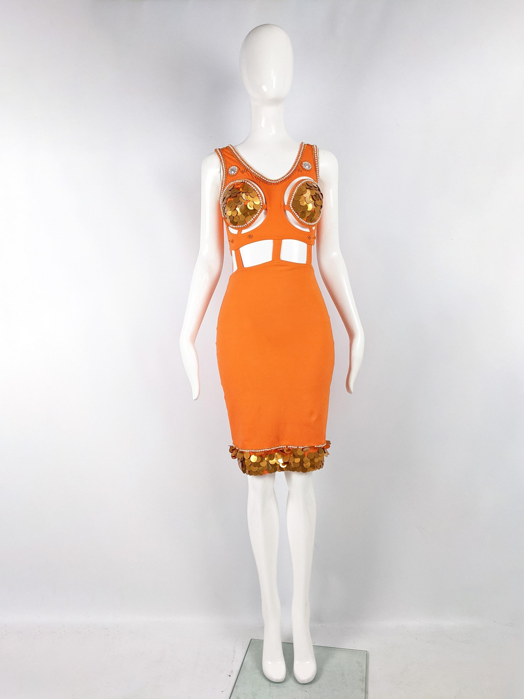 A sexy vintage womens bodycon dress from the late 80s / early 90s by Tropical Climax. In an orange stretch bodycon fabric with pailettes, beads and sequins on the bust and hem with cut outs at the bust and waist. Perfect for a party or evening