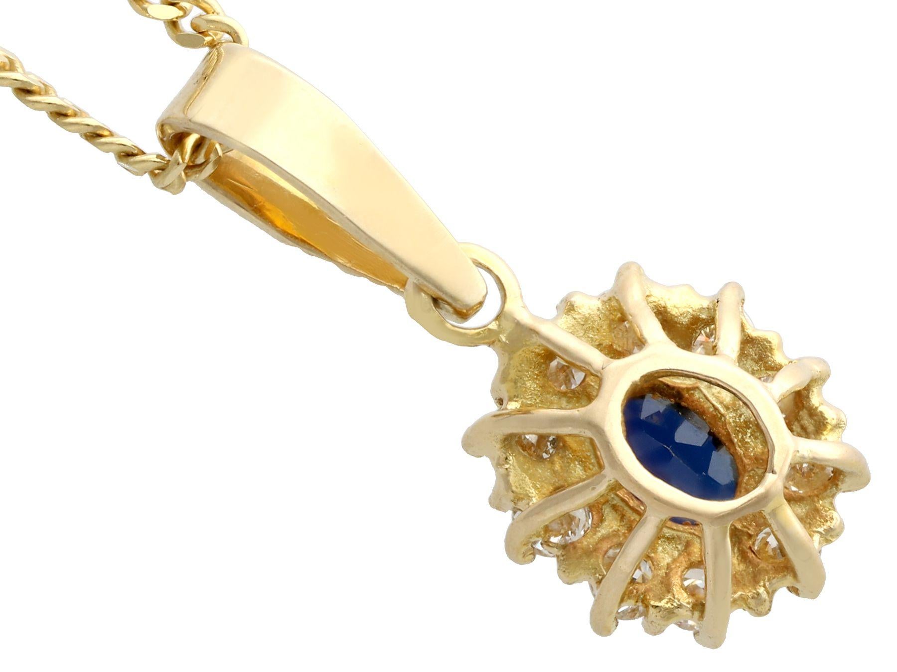 Vintage 1980s Oval Cut Sapphire and Diamond Yellow Gold Cluster Pendant For Sale 1