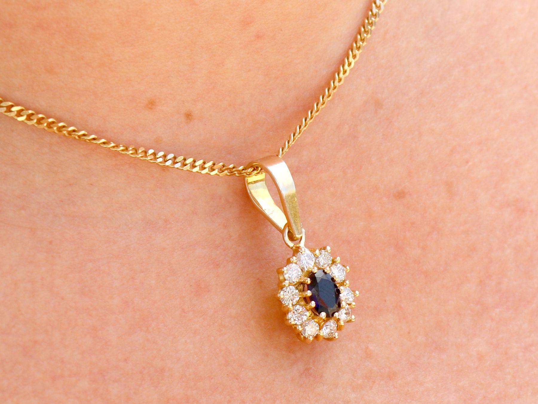 Vintage 1980s Oval Cut Sapphire and Diamond Yellow Gold Cluster Pendant For Sale 4