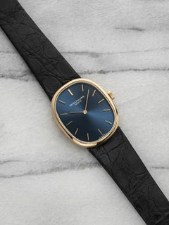 Vintage 1980s Patek Philippe Ellipse 3848J 18K YG Blue Sunburst Dial Manual 27mm