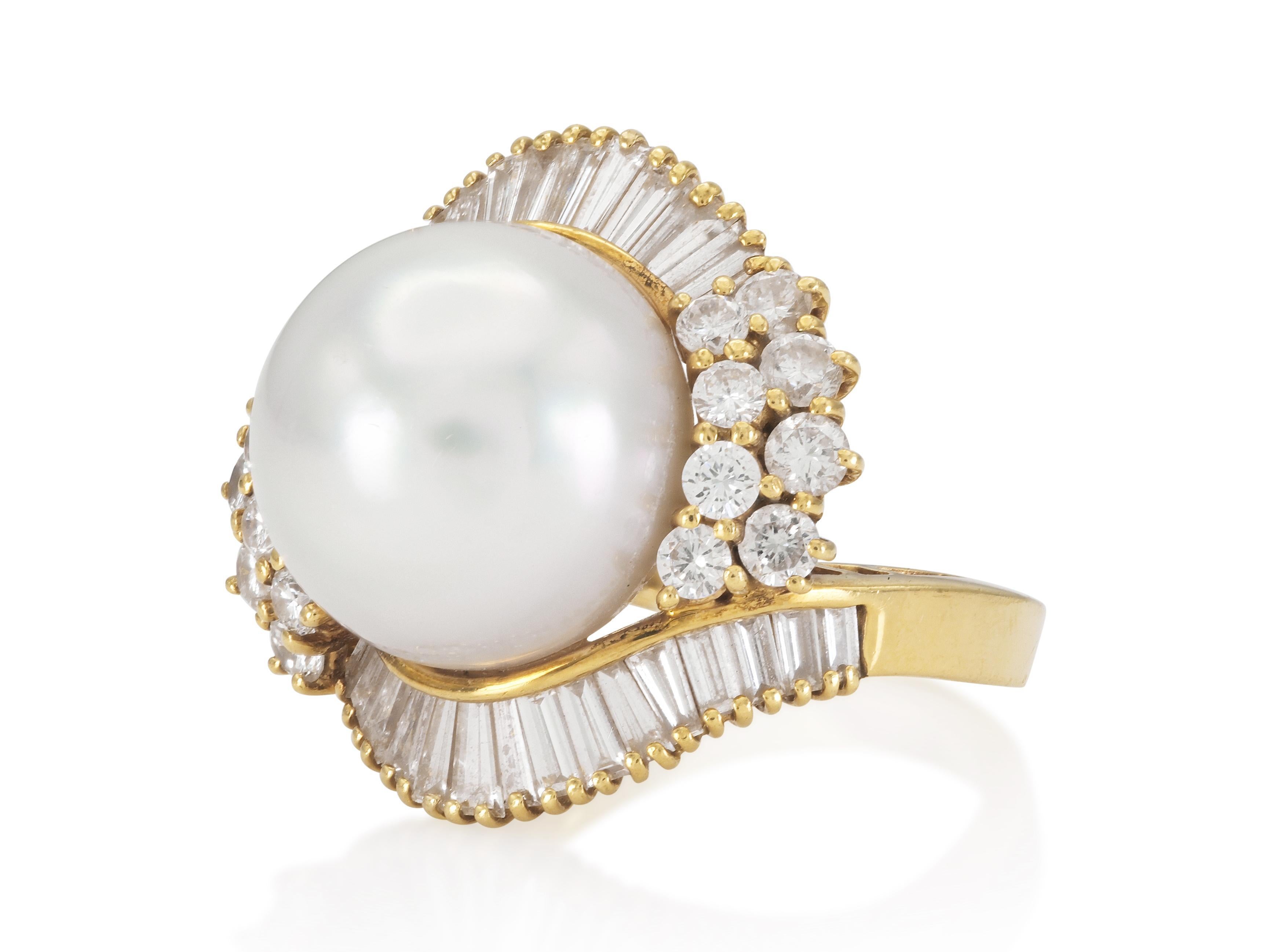 Finely crafted in 18k yellow gold with a South Sea Pearl measuring 13.74mm, and Round Brilliant and Baguette cut Diamonds weighing approximately a total of 2.50 carats.
Circa 1980s
Size 6 1/2