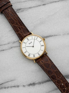 Vintage 1980s Piaget 8035 N Dress Watch 18K YG White Roman Dial Quartz 32 mm