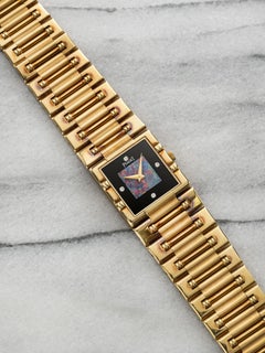 Vintage 1980s Piaget Dancer 80317 K 81 Yellow Gold Quartz Opal & Onyx Dial