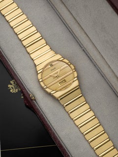 Vintage 1980s Piaget Polo 15562 C701 18K Yellow Gold Champagne Dial Quartz 31mm