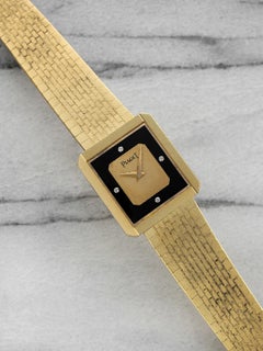 Vintage 1980s Piaget Protocole 18K YG Manual Onyx Diamond Champagne Dial 28mm