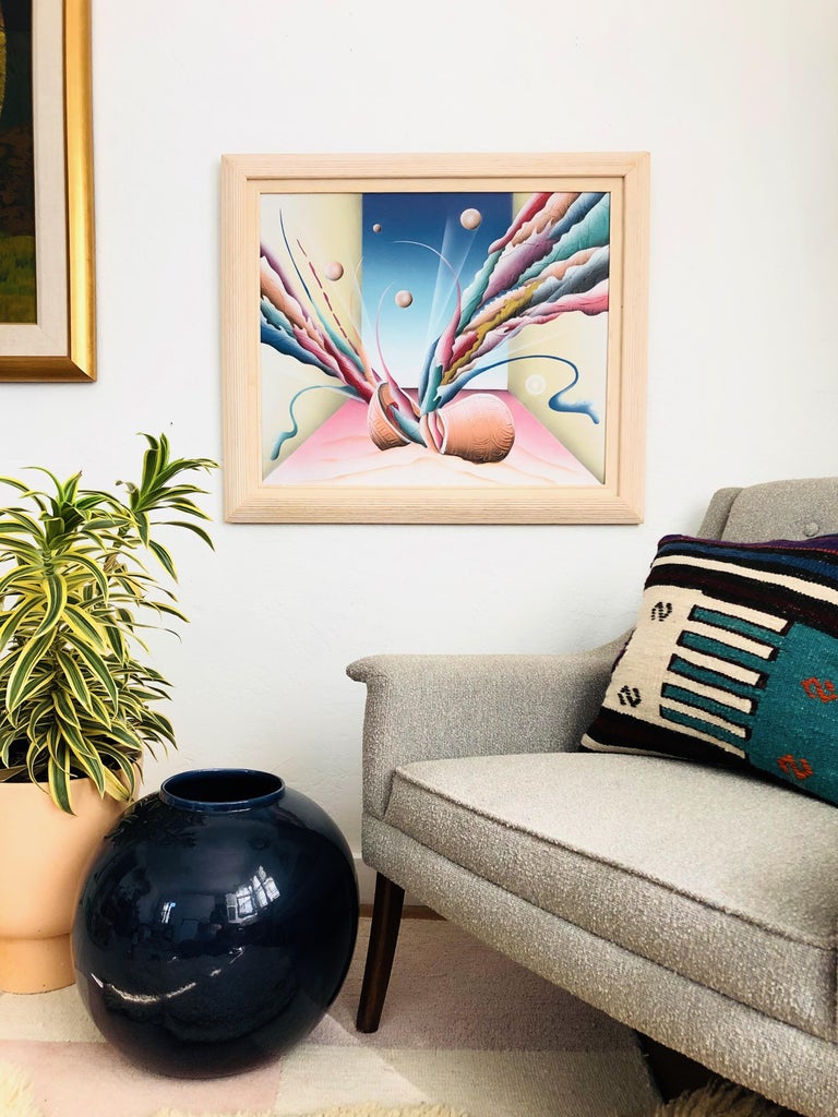 A vintage 1980s postmodern surrealist acrylic painting on canvas. Great futuristic imagery in vibrant colors with textured vase in the foreground. Siginature on the bottom corner. Framed in a white washed wood frame.
   