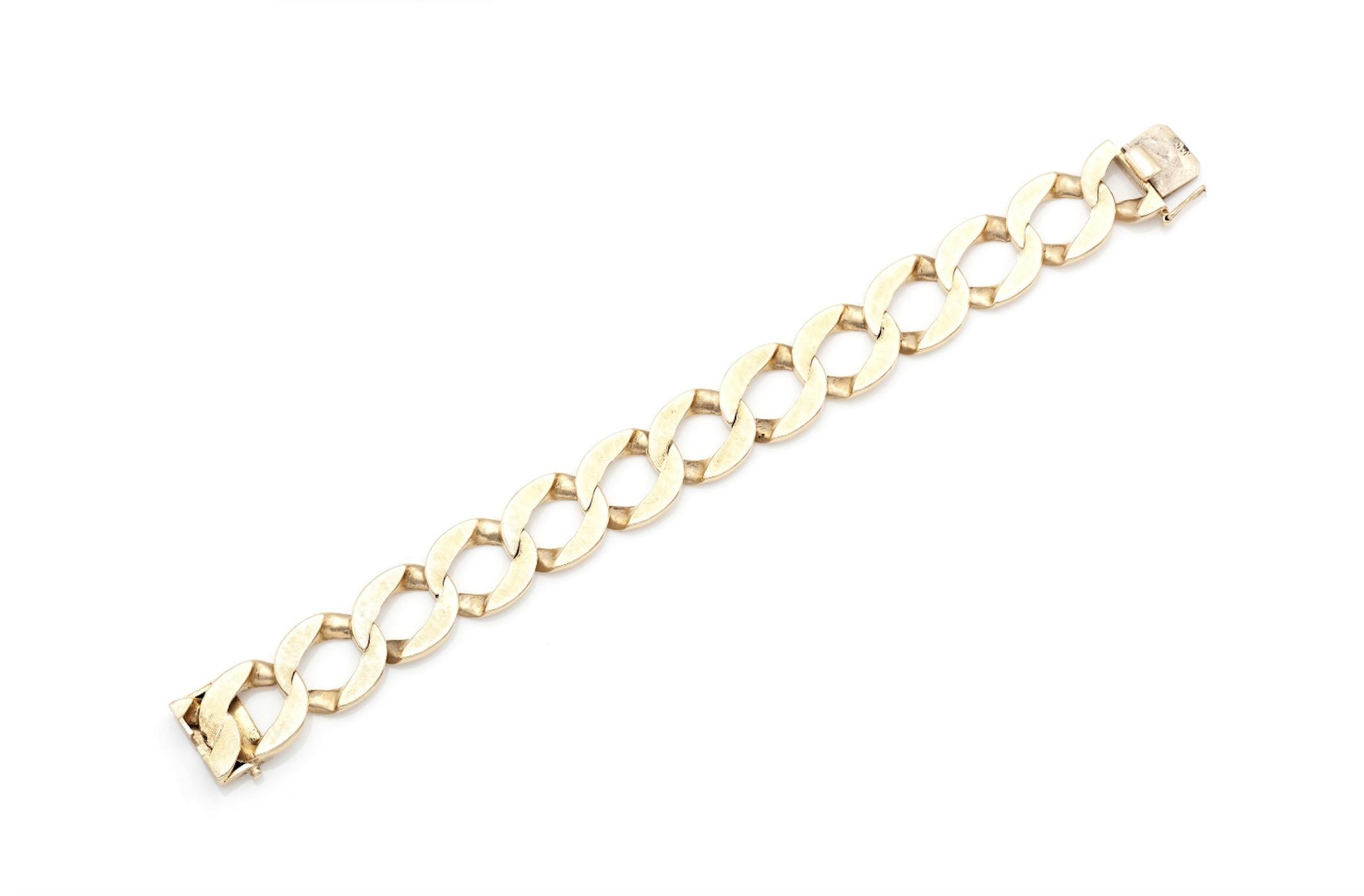 Finely crafted in 14k yellow gold with one a textured side as well as a smooth side.
Can be worn both ways.
Circa 1980s
Size 8 inches