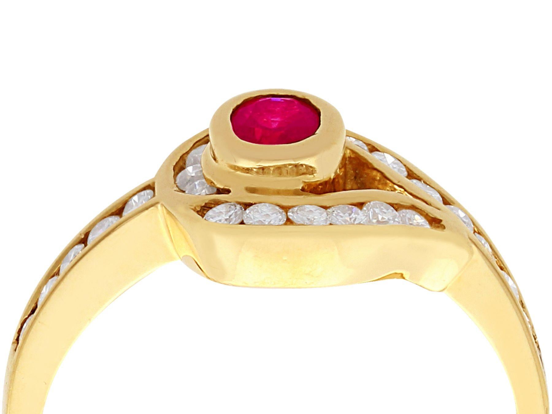 An impressive 0.28 carat ruby and 0.39 carat diamond, 18 karat yellow gold twist design cocktail ring; part of our diverse vintage jewelry and estate jewelry collections.

This fine and impressive ruby and diamond ring has been crafted in 18k yellow