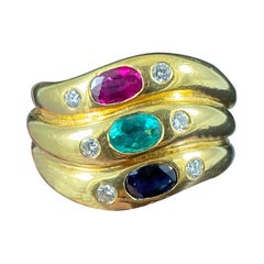 Vintage 1980s Ruby Emerald Sapphire Diamond 19.2 Karat Yellow Gold Stacked Ring