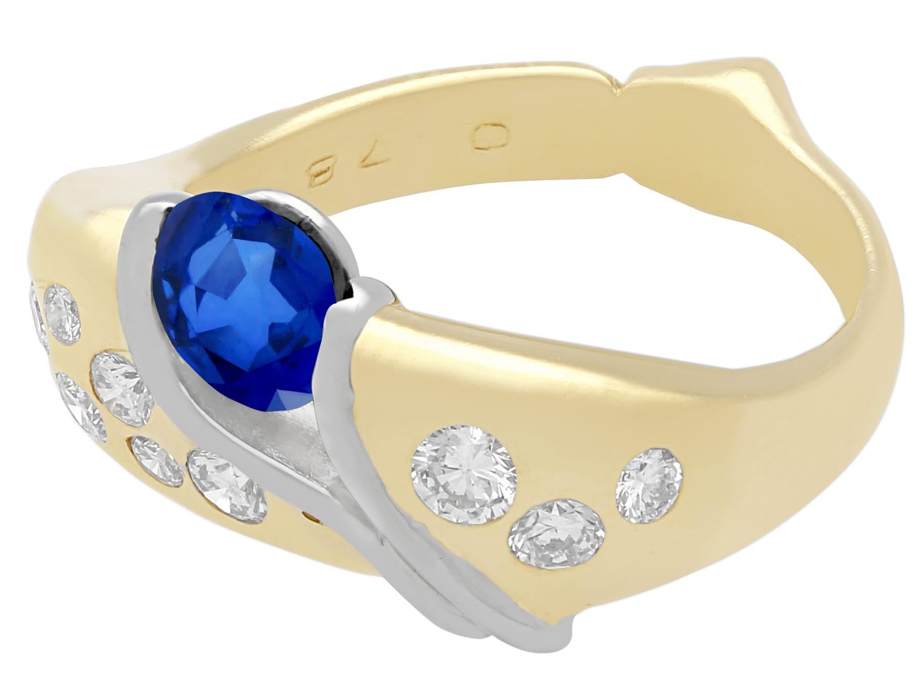 An impressive vintage 0.97 carat sapphire and 0.48 carat diamond, 18 karat yellow and white gold cocktail ring; part of our diverse vintage jewelry and estate jewelry collections

This fine and impressive sapphire and diamond band ring has been