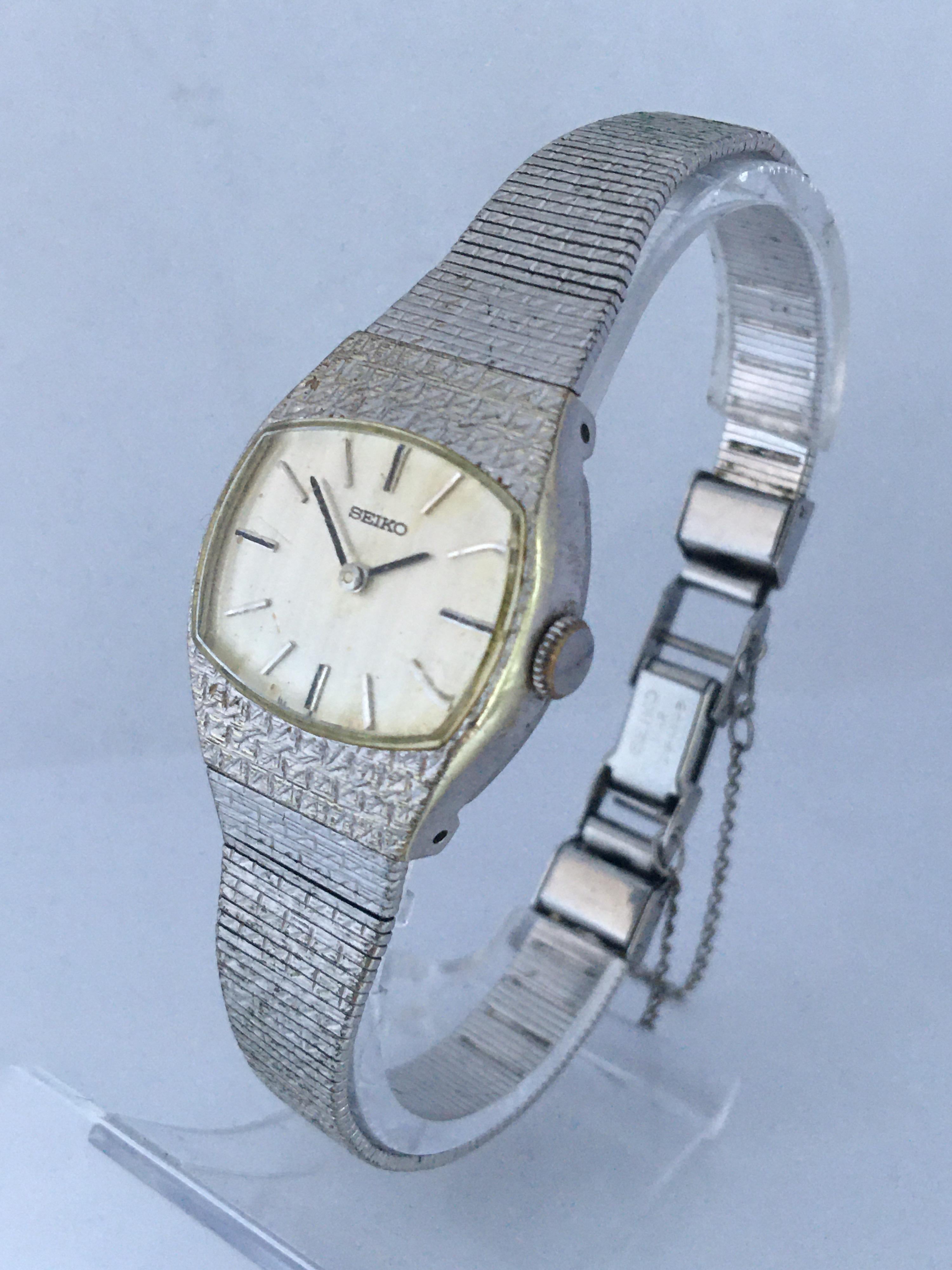 This beautiful 6.5 inches bracelet pre-owned Ladies Watch is working and it is running well. Visible signs of ageing and wear with some tiny scratches on its stainless steel back bracelet and some tarnished.

Please study the images carefully as