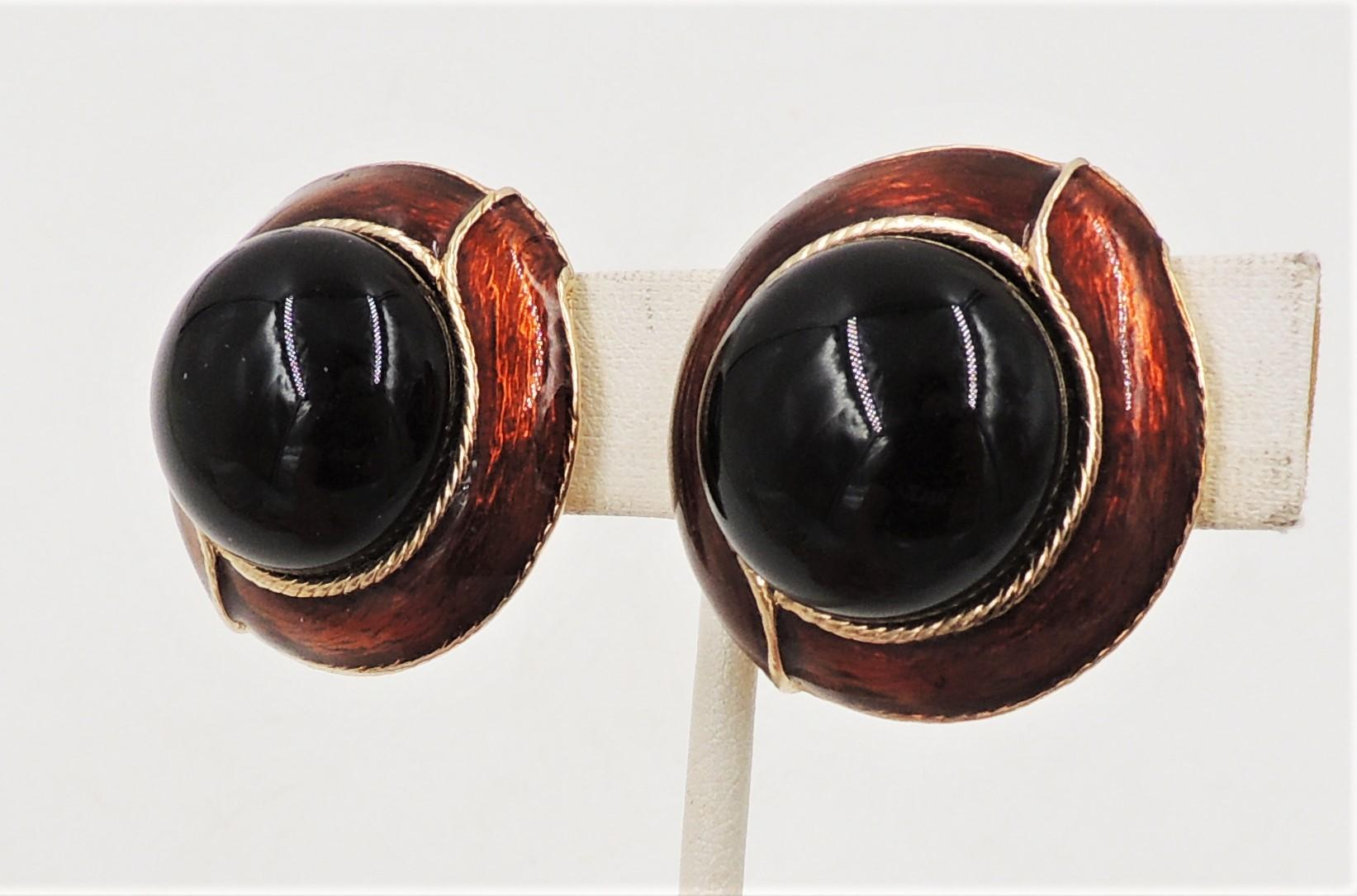 1980s goldtone cabochon faux-onyx and brown metallic enamel round clip back earrings. Marked 