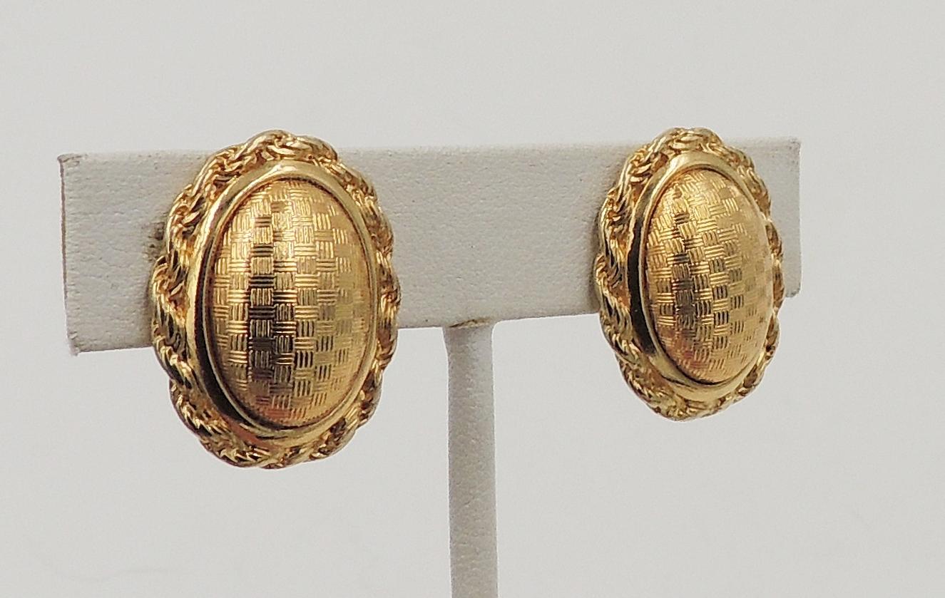 1980s goldtone domed checked clip back earrings. Marked 