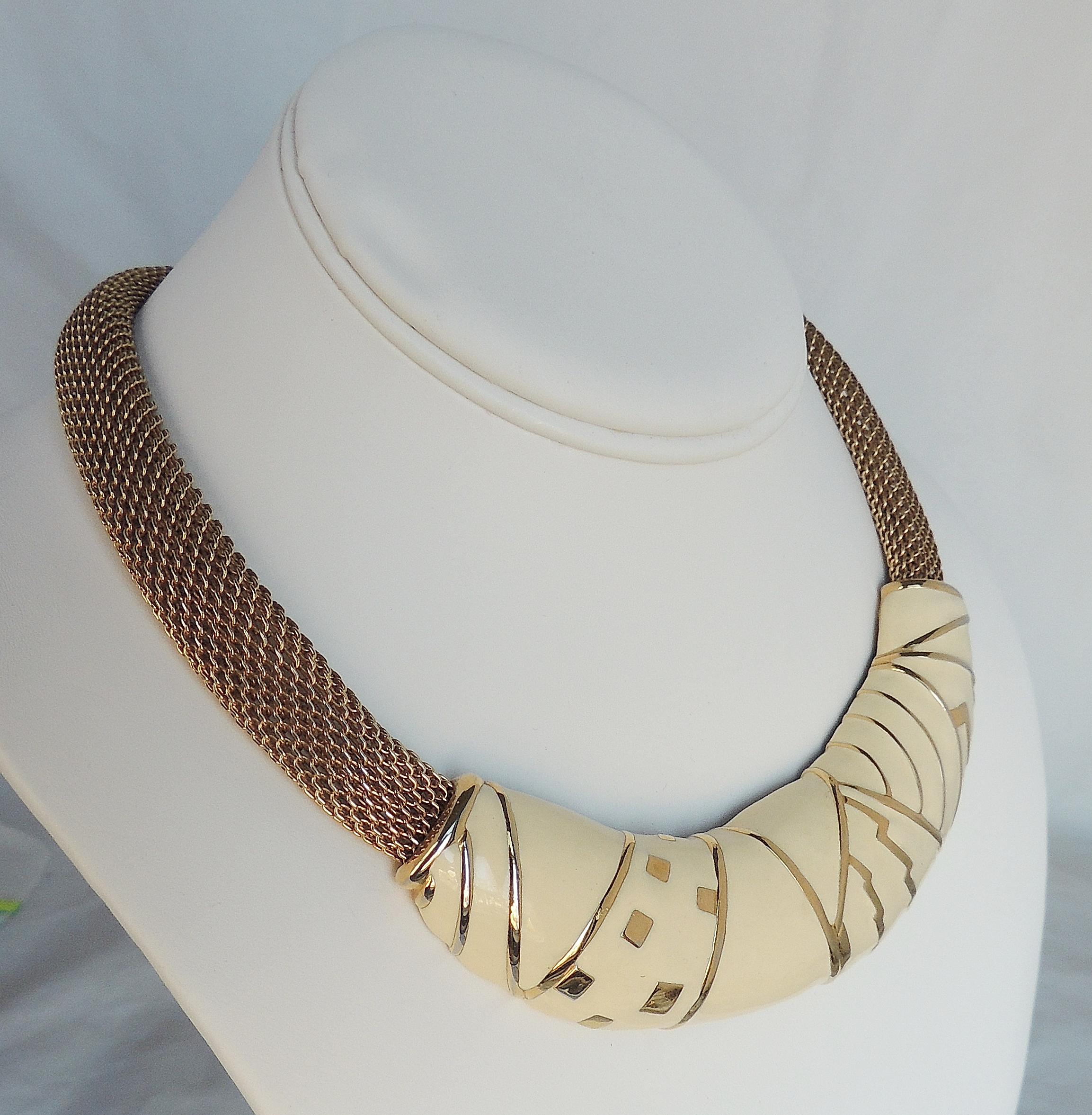 1980s Modernist goldtone and white enamel collar necklace with fold-over clasp. Marked: 