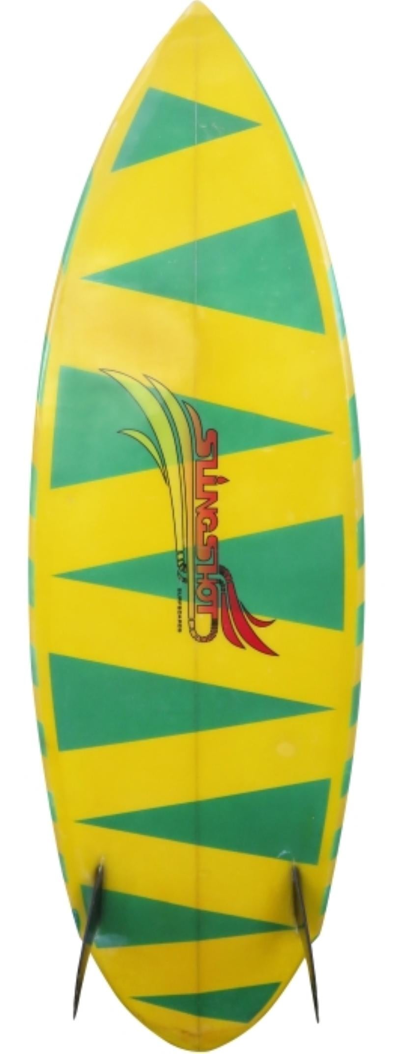 Mid-1980s vintage slingshot twin fin shortboard shaped by Steve Borron. Features vibrant double sided green/yellow airbrush designs. A fantastic example of a 1980s retro surfboard with vintage airbrush.
    