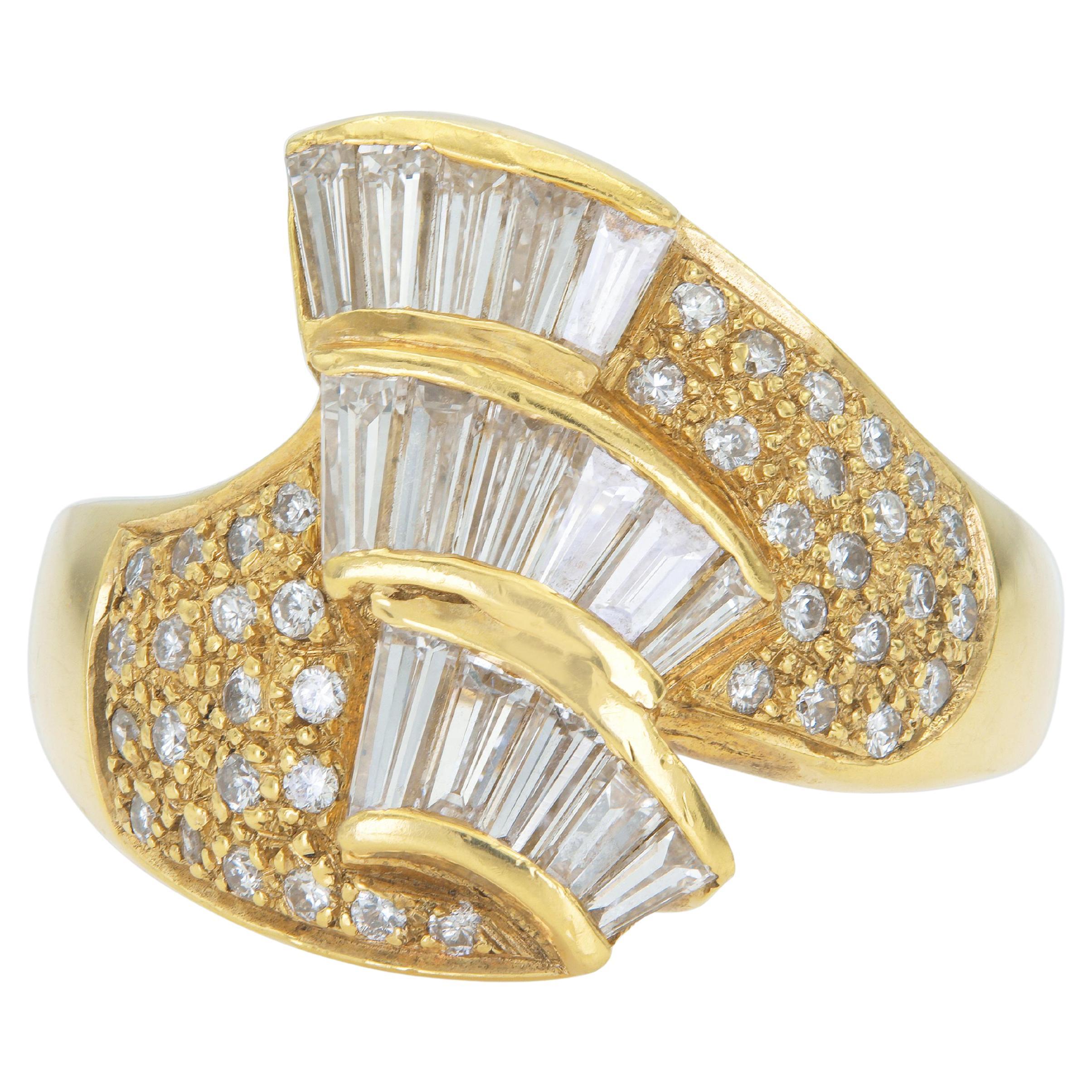 Anello vintage degli anni 
80 con diamanti taglio baguette e tondo