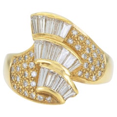 Anello vintage degli anni 
80 con diamanti taglio baguette e tondo