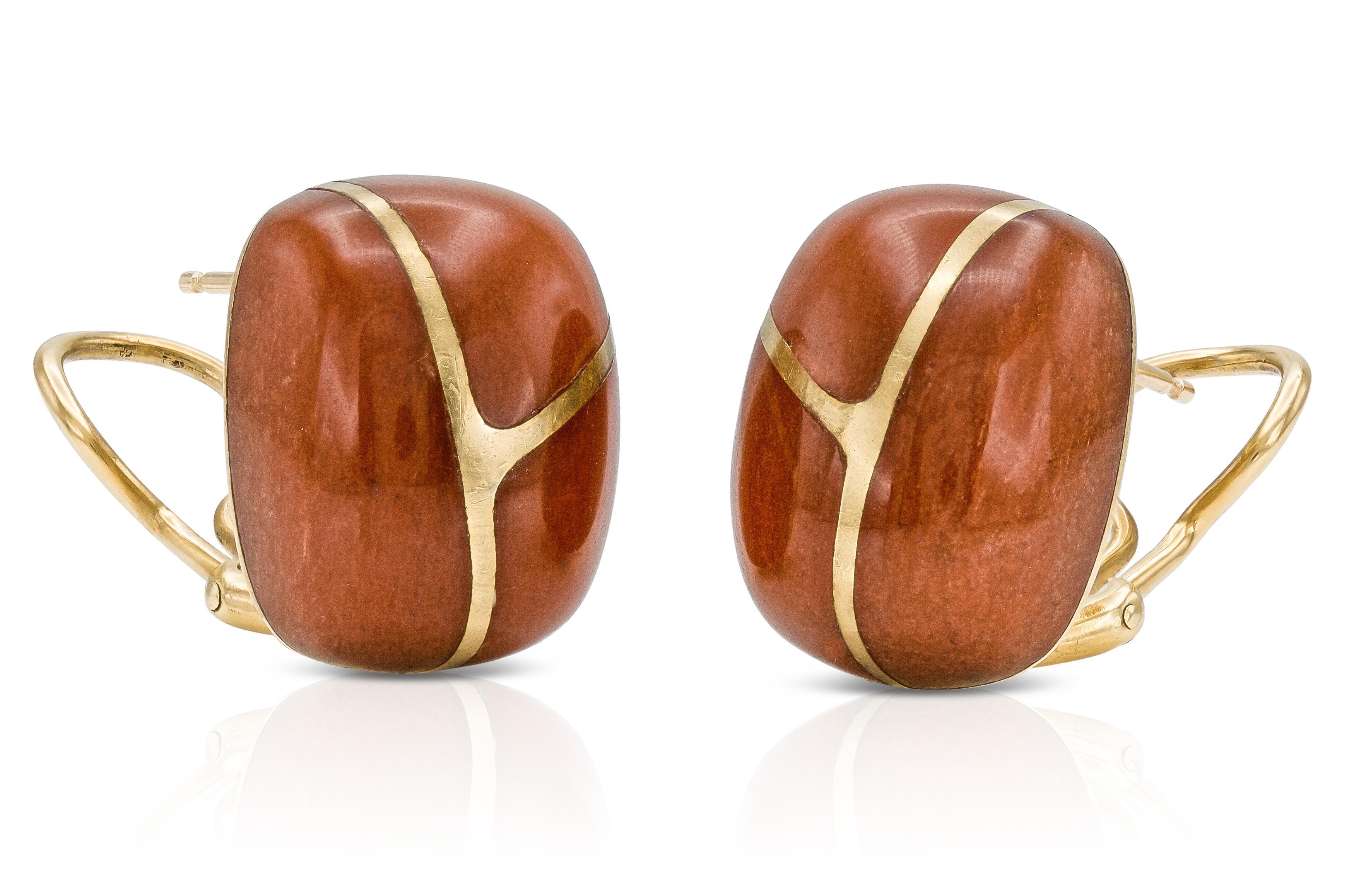 Finely Crafted in 18k yellow gold with Carnelians.
Signed by Angela Cummings for Tiffany & Co.
Circa 1980s
3/4 x 1/2 inch