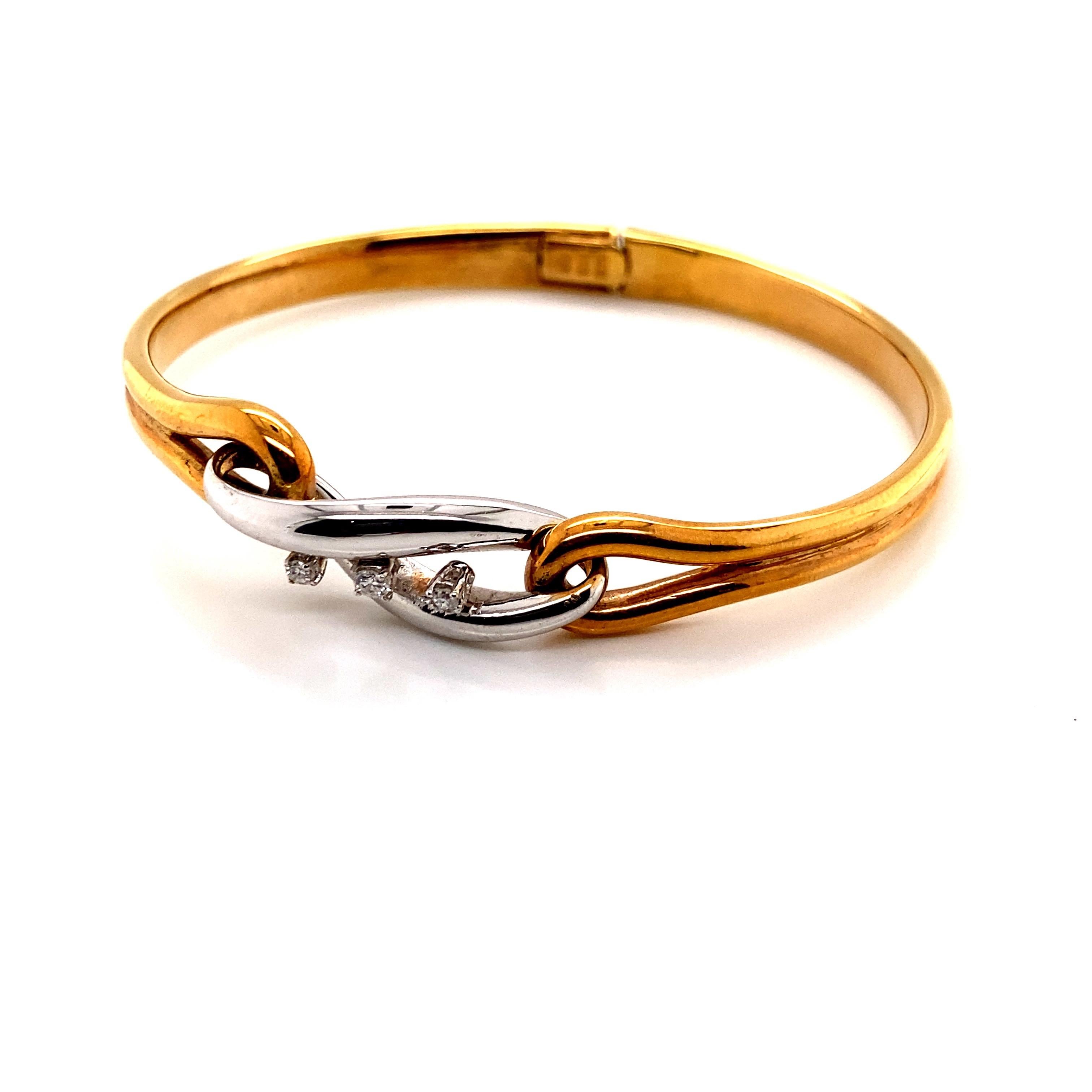 Contemporary Vintage 1980's Two Tone 14K Gold Bangle Bracelet with Three Diamonds For Sale