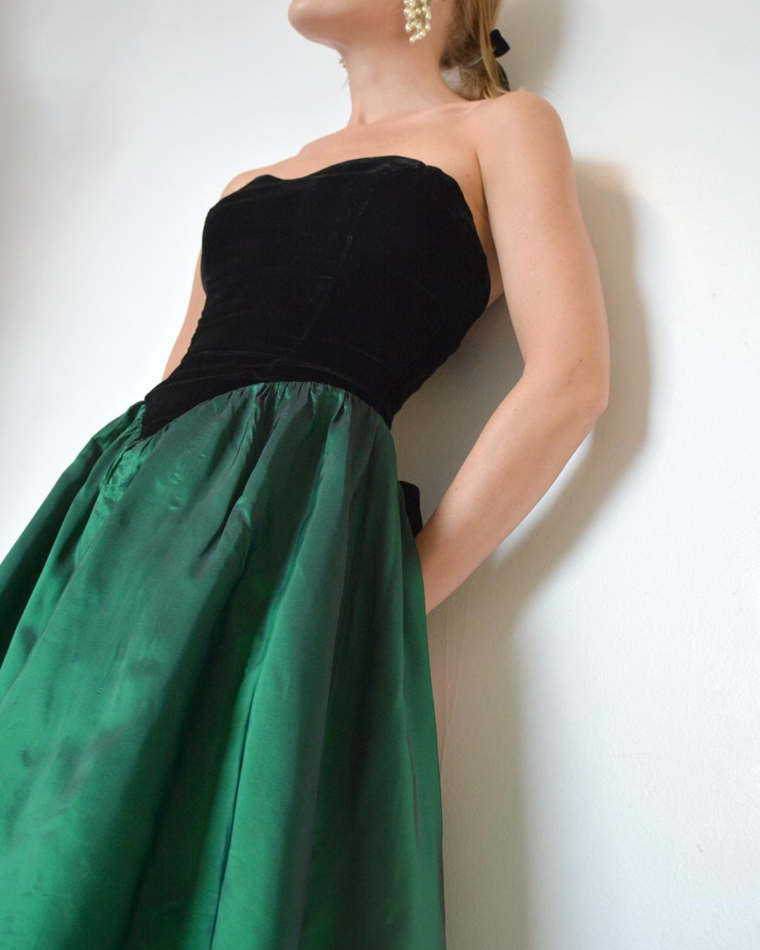 This vintage 1980s velvet-bodice cocktail dress features the sweetest bow detail in the back. It does not have a label but I've had 1980s dresses from both Laura Ashley and Gunne Sax that are this exact silhouette. (This specific piece was custom