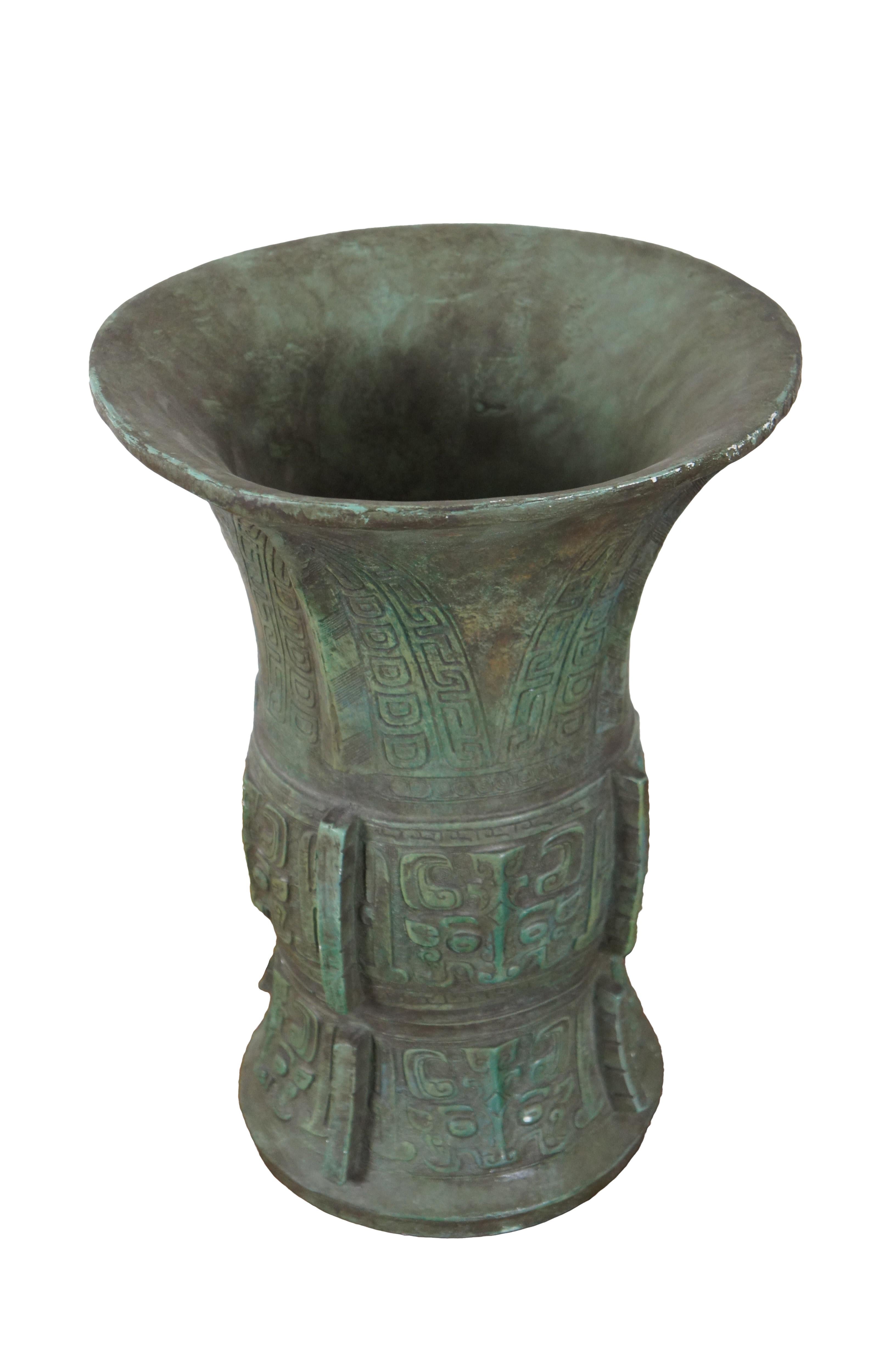 Vintage Alva 1981 museum replica vase made to resemble ancient Chinese or Mayan bronze vases / wine vessels. Crafted of chalkware and painted in green and brown, mimicking aged patina on metal.

Dimensions:
8.5” x 11.75” (Diameter x Height)