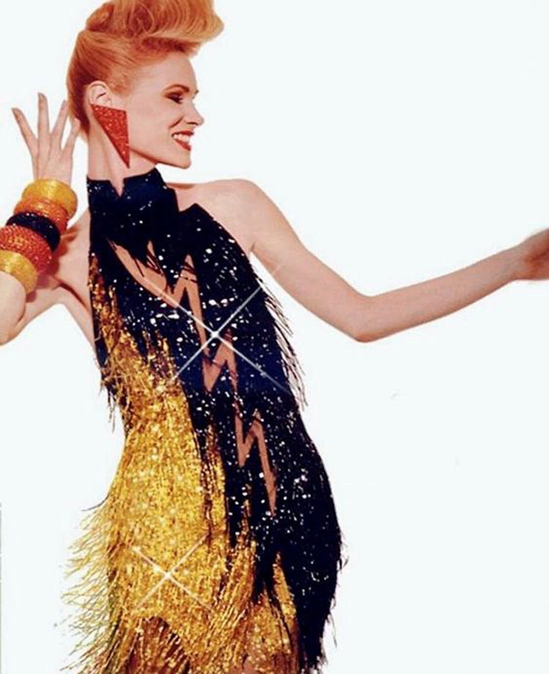 Fierce fully-beaded sequin Bob Mackie designer dress dating back to the early 1980's. Mackie began his career as a Hollywood costuming sketch artist, working for both Edith Head and Jean Louis. While working with designer Ray Aghayan, Mackie soon