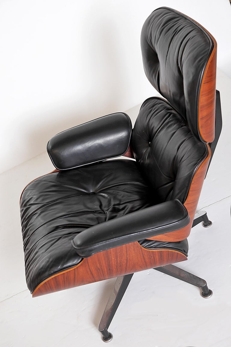 Vintage 1983 Eames Lounge Chair and Ottoman of Rosewood and Black