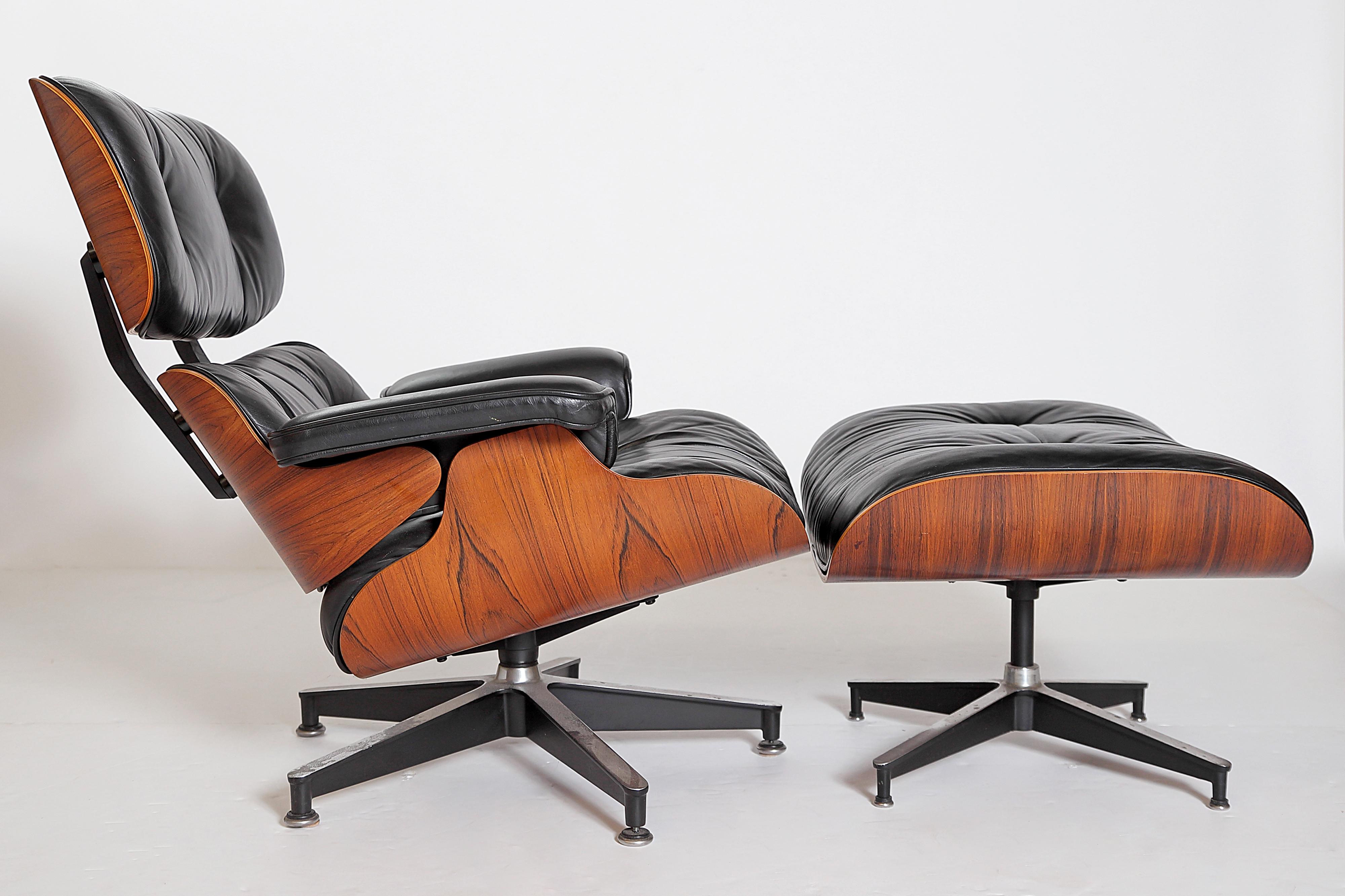 Cast Vintage 1983 Eames Lounge Chair and Ottoman of Rosewood and Black Leather