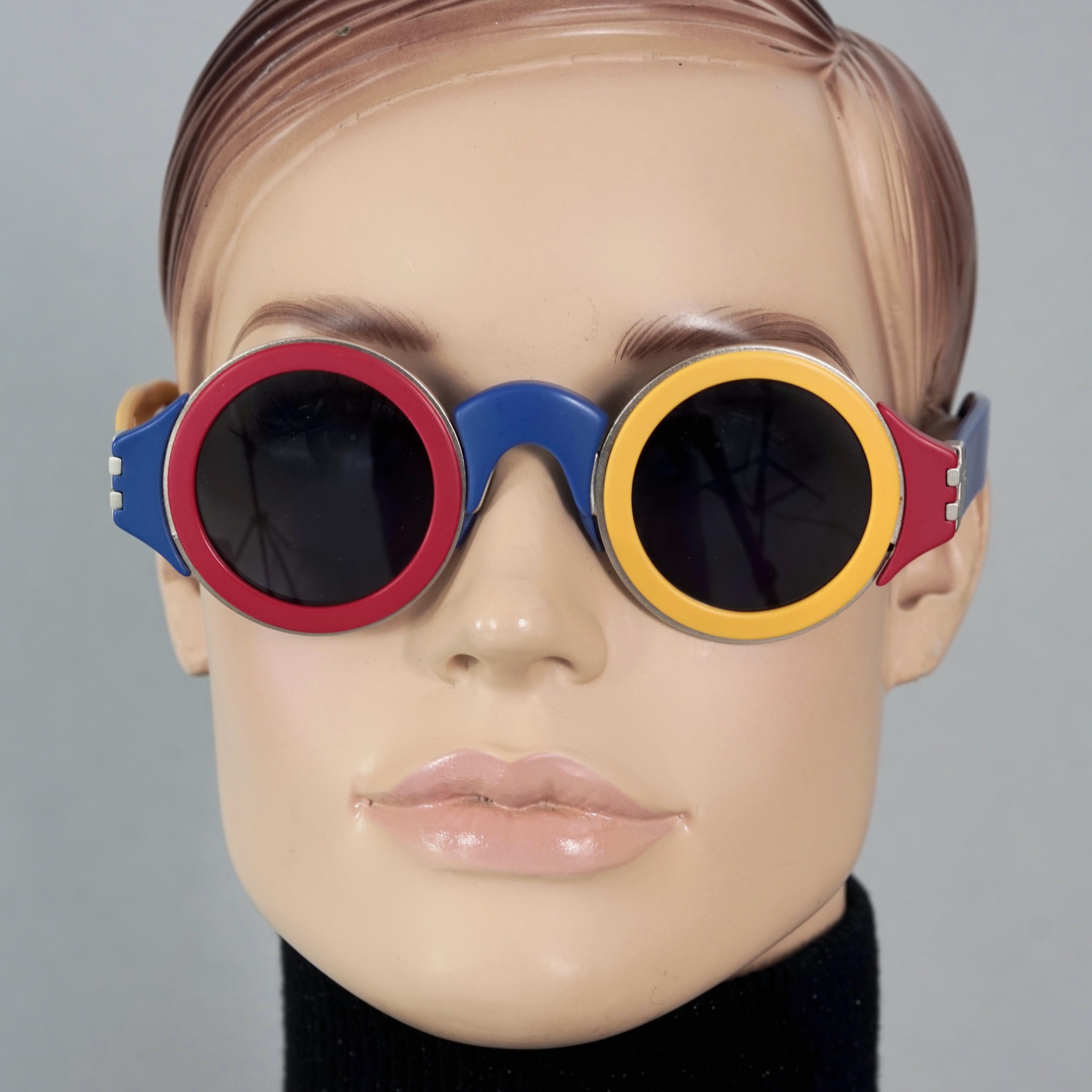 Vintage 1985 KARL LAGERFELD Color Block Limited Edition Sunglasses
Only 2000 pieces were made. This is numbered 0742/ 2000.

Measurements:
Frame Height: 1.96 inches (5 cm)
Hinge to hinge Width: 5.51 inches (14 cm)
Temples: 5.39 inches (13.7