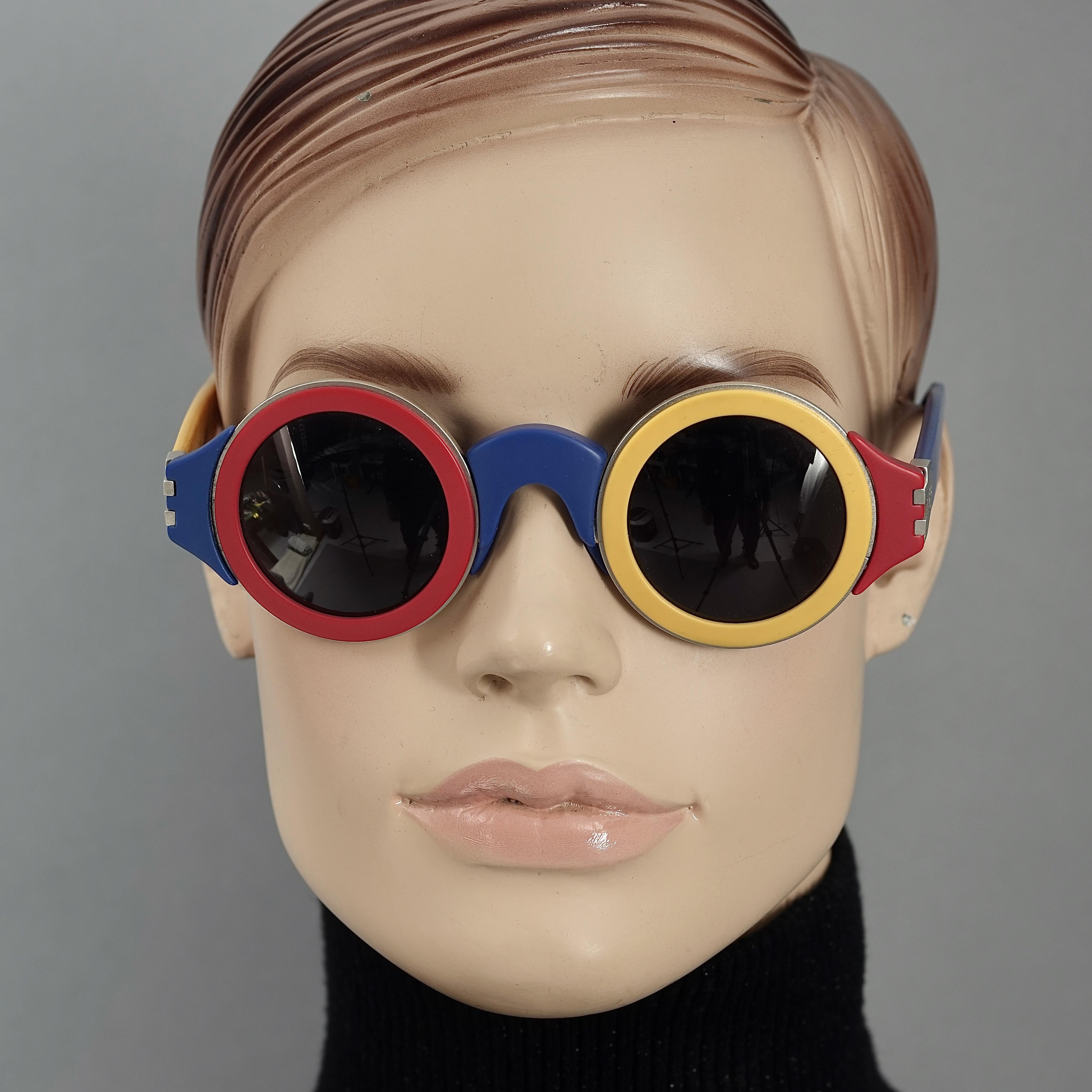 Vintage 1985 KARL LAGERFELD Color Block Limited Edition Sunglasses
Only 2000 pieces were made. This is numbered 0559/ 2000.

Measurements:
Frame Height: 2 inches (5.08 cm)
Hinge to hinge Width: 5 4/8 inches (13.97 cm)
Temples: 5 4/8 inches (13.97