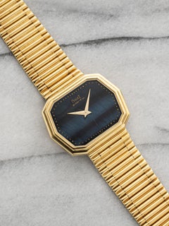 Vintage 1985 Piaget Reference 75608 18K Gold Quartz Hawkeye Stone Dial 30x24mm