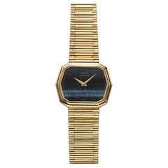 Vintage 1985 Piaget Reference 75608 18K Gold Quartz Hawkeye Stone Dial 30x24mm Vintage 1985 Piaget Reference 75608 18K Gold Quartz Hawkeye Stone Dial 30x24mm