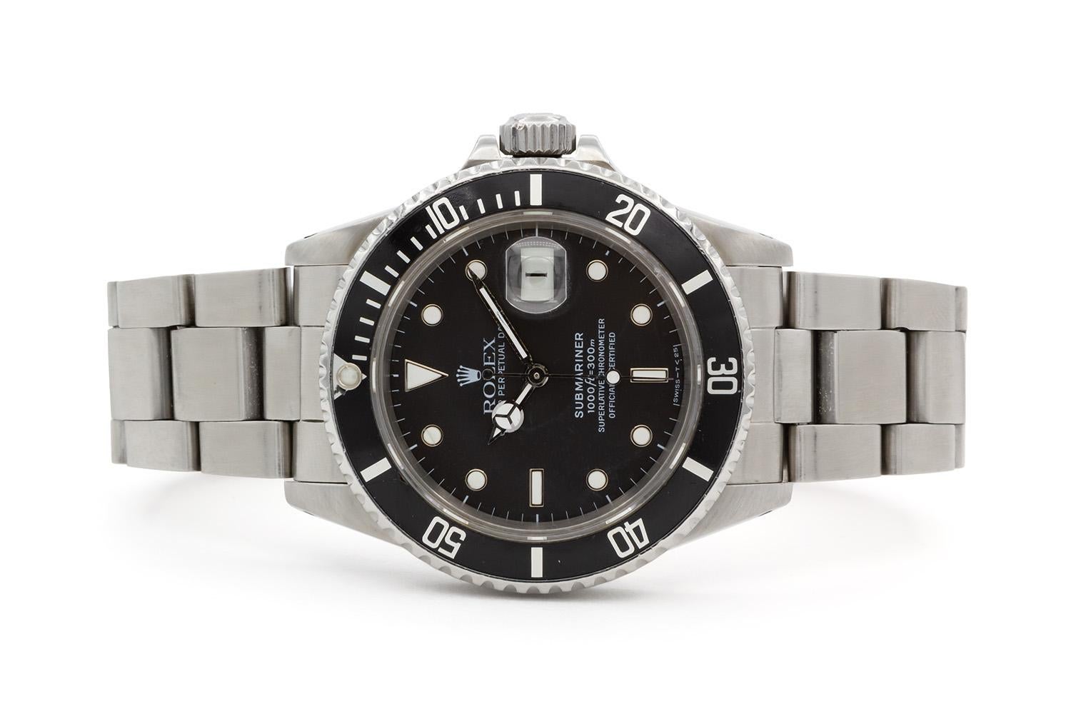 We are pleased to offer this Vintage 1985 Rolex Stainless Steel Submariner 16800. This classic and highly sought after Rolex sport watch features a 40mm stainless steel case, factory original black metal insert time-lapse bezel and factory original