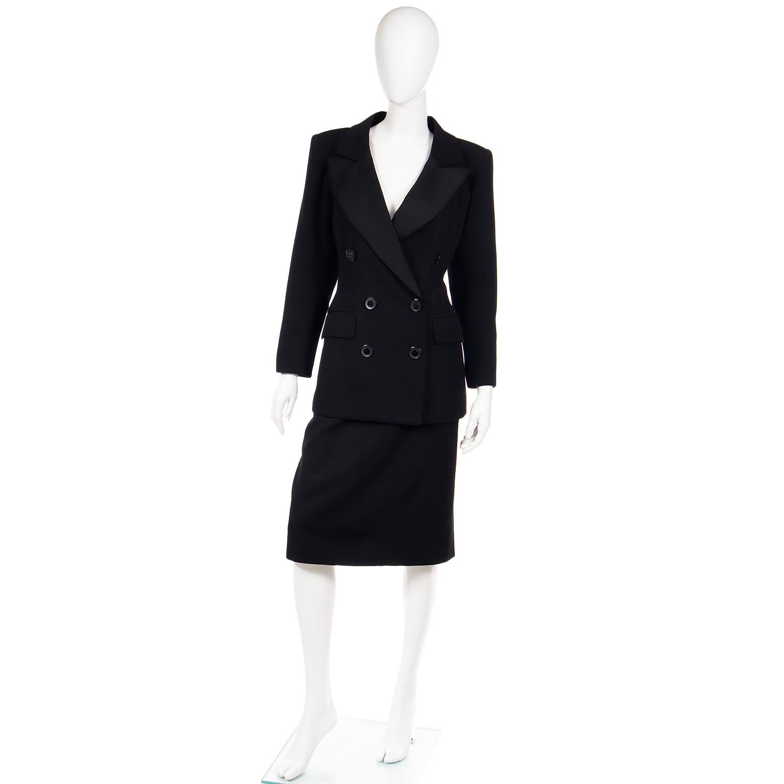This is a gorgeous vintage YSL skirt suit from the Yves Saint Laurent Spring/Summer 1987 collection. This suit has a double breasted black tuxedo style jacket paired with a black wool pencil skirt. Of course, you can always wear the pieces