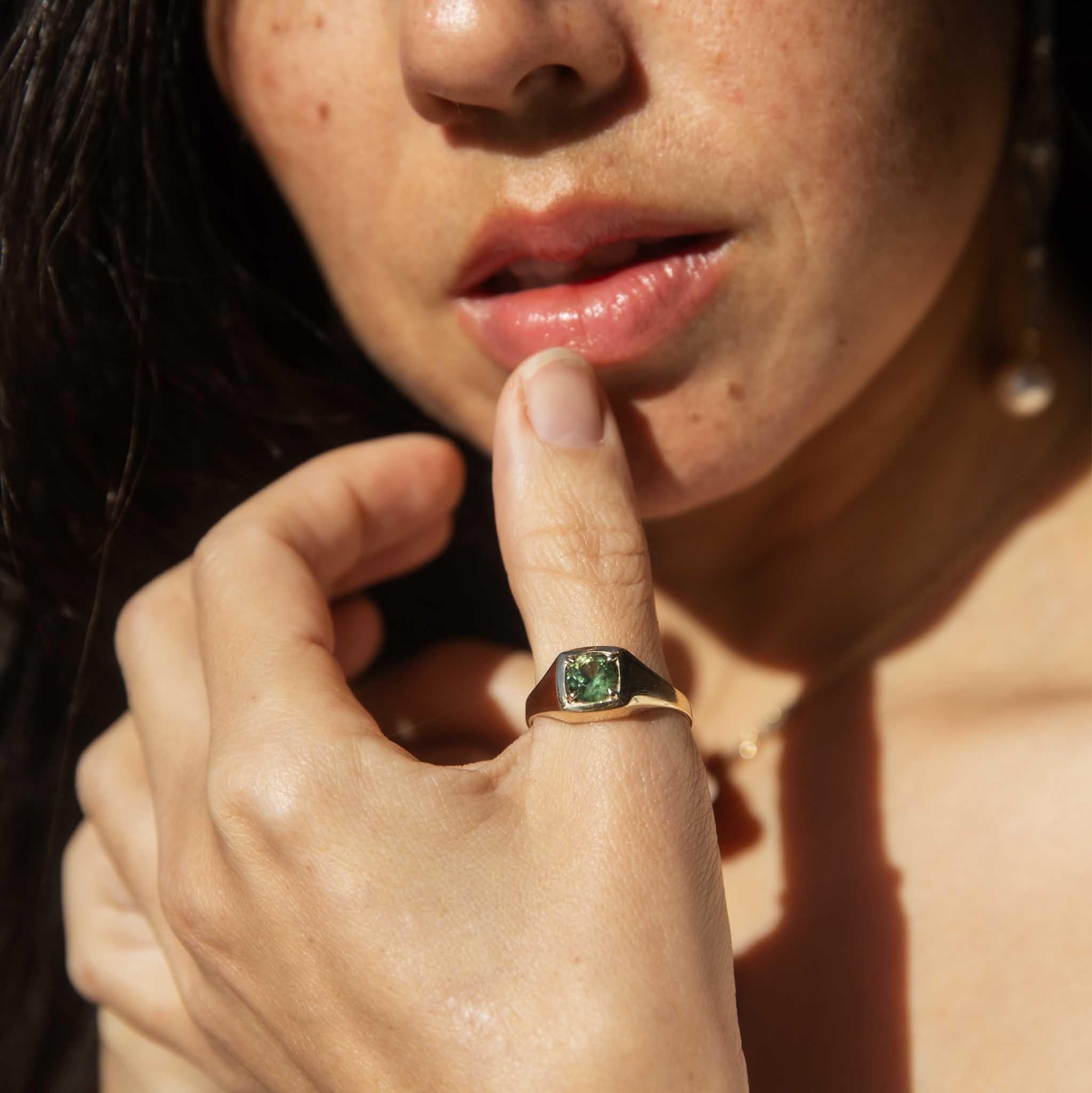The Jaida Ring is a gift from 1989.  With her vivid green 1.99 carat sapphire atop a ring of 9 carat gold, she shines bright.  Crafted with simplicity she leaves a memorable impression. 

The Jaida Ring Gem Details
The bright green Australian