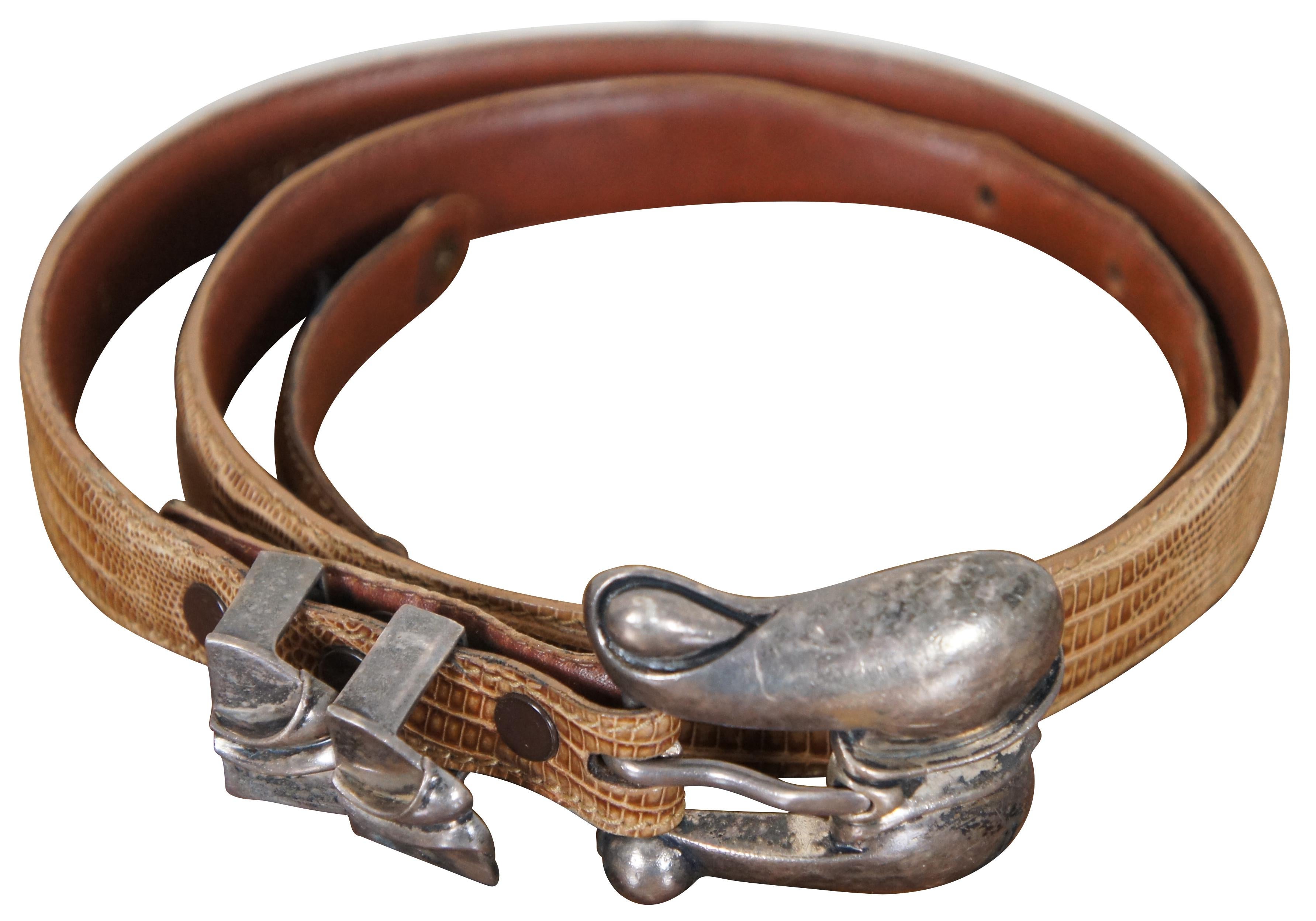 Vintage 1990 Barry Kieselstein-Cord light brown genuine lizard skin belt with Art Nouveau style sterling silver buckle number 290.

Measures: 39” x 1” / Fits - 27.5” to 31.5” / Buckle - 2” x 0.25” x 1.75” / 85 g (length x width).

