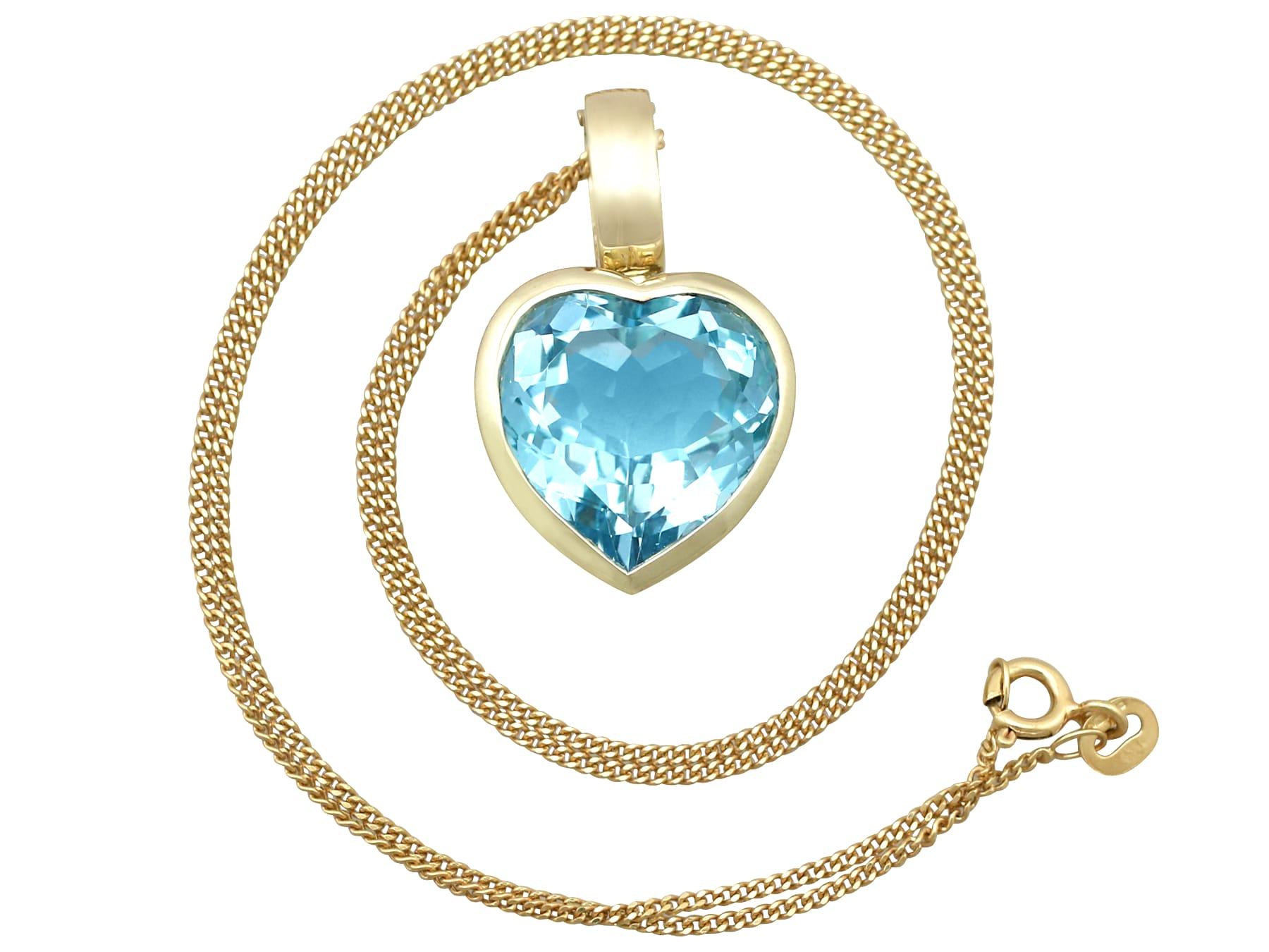 A fine and impressive 13.50 carat blue topaz and 9 karat yellow gold heart shaped pendant; part of our diverse vintage jewelry and estate jewelry collections.

This fine and impressive topaz heart pendant has been crafted in 9k yellow gold.

The