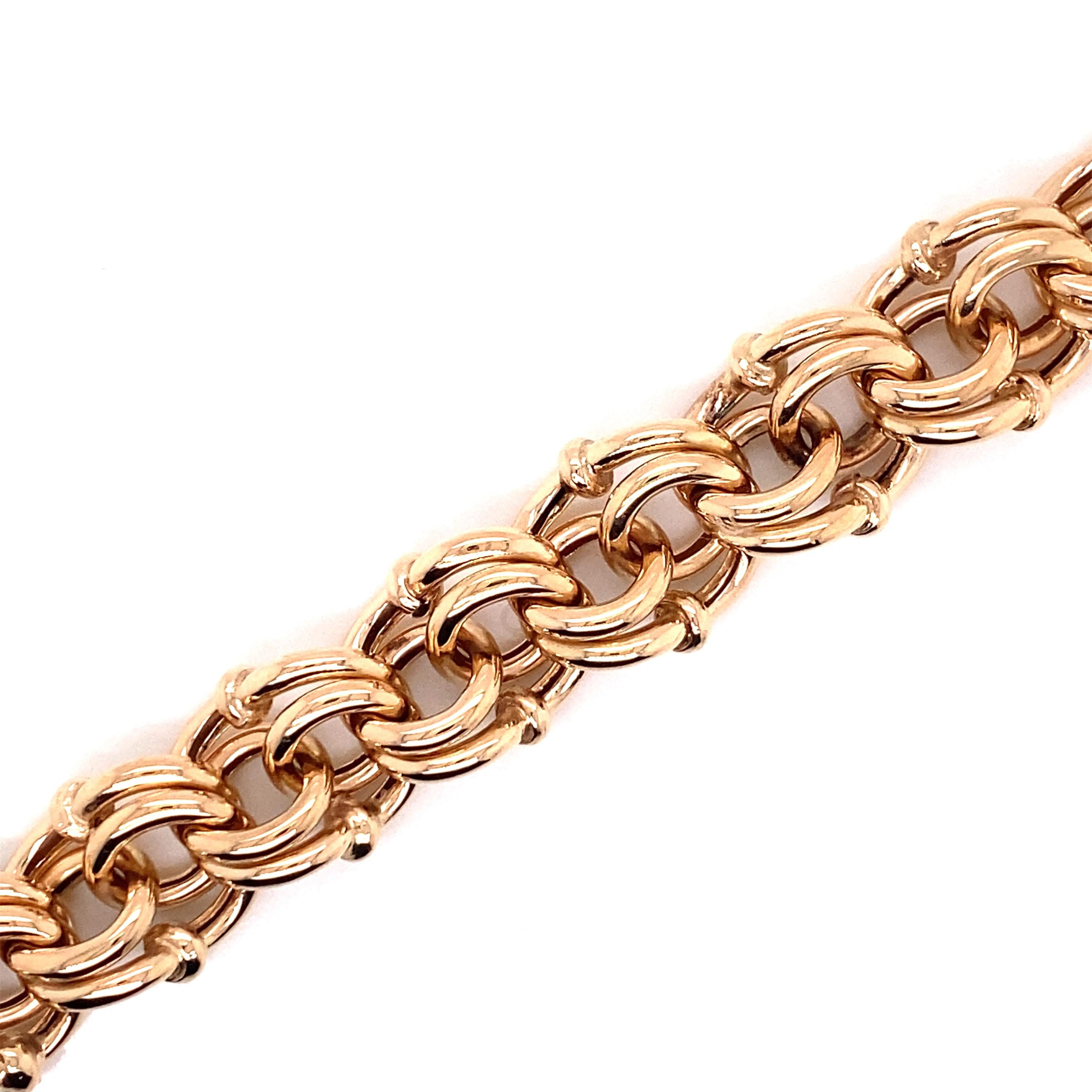 Vintage 1990's 14K Rose Gold Wide Charm Link Bracelet - Le bracelet mesure 0,5 pouces de large et 8 pouces de long et dispose d'un fermoir à piston caché avec un loquet de sécurité. Le bracelet pèse 26,63 grammes d'or. 