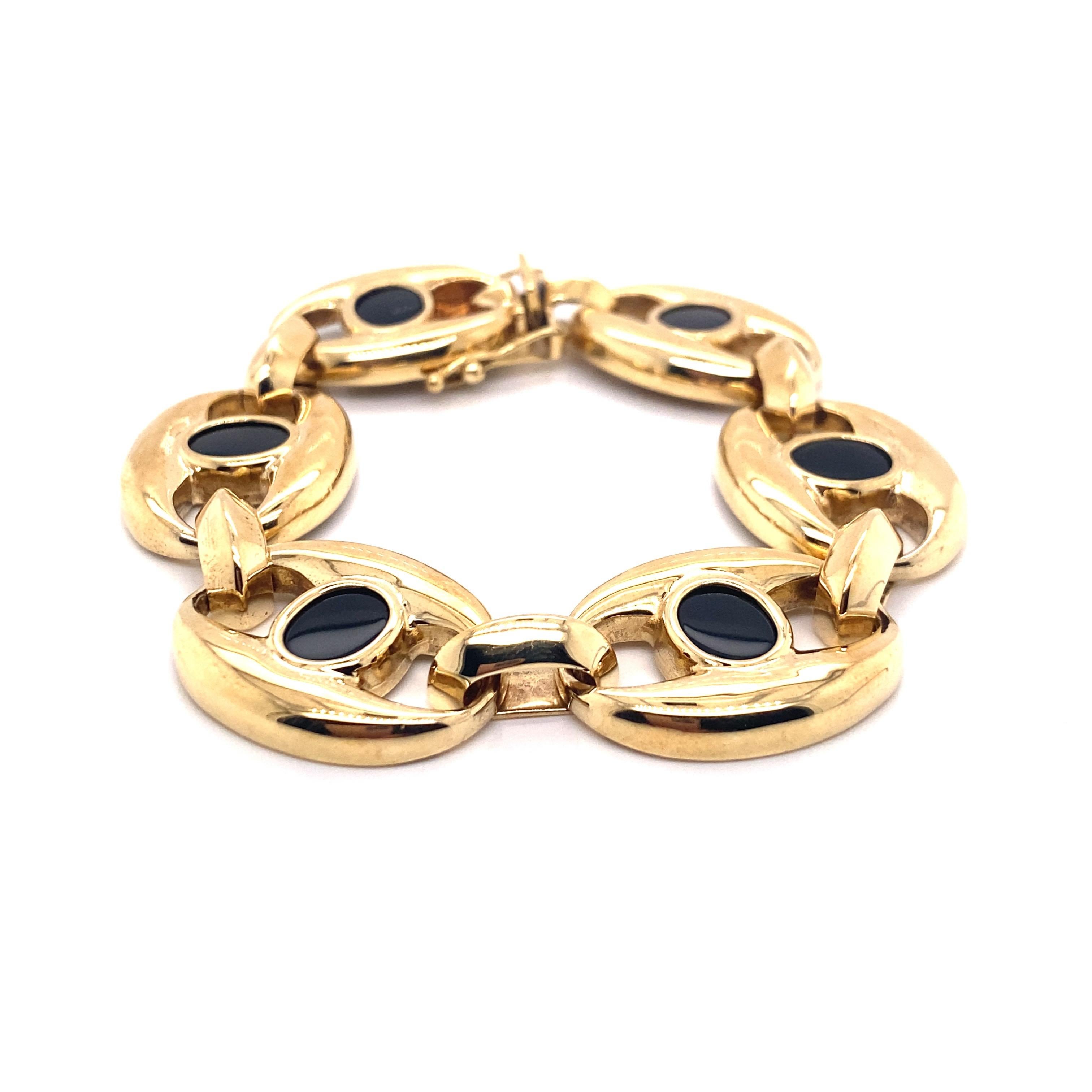 Taille ovale Bracelet vintage des années 1990 en or jaune 14 carats et onyx en vente