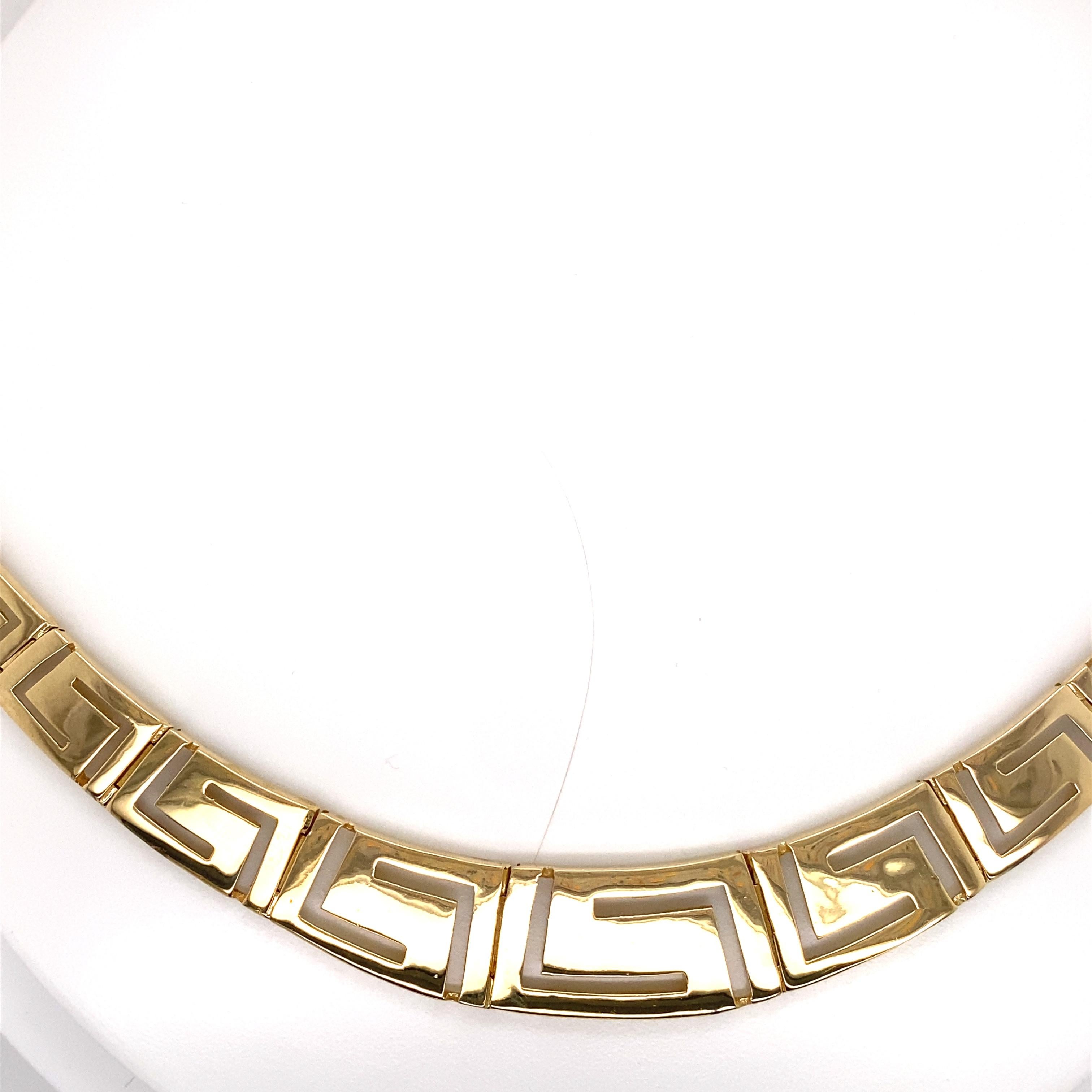 Vintage 1990’s 14K Yellow Gold Greek Key Necklace - The Greek Key design graduates in width from 15mm in the front to 5mm in the back. The necklace is 17 inches long and features a plunger clasp with a figure 8 safety. The necklace weighs 37.1 grams.