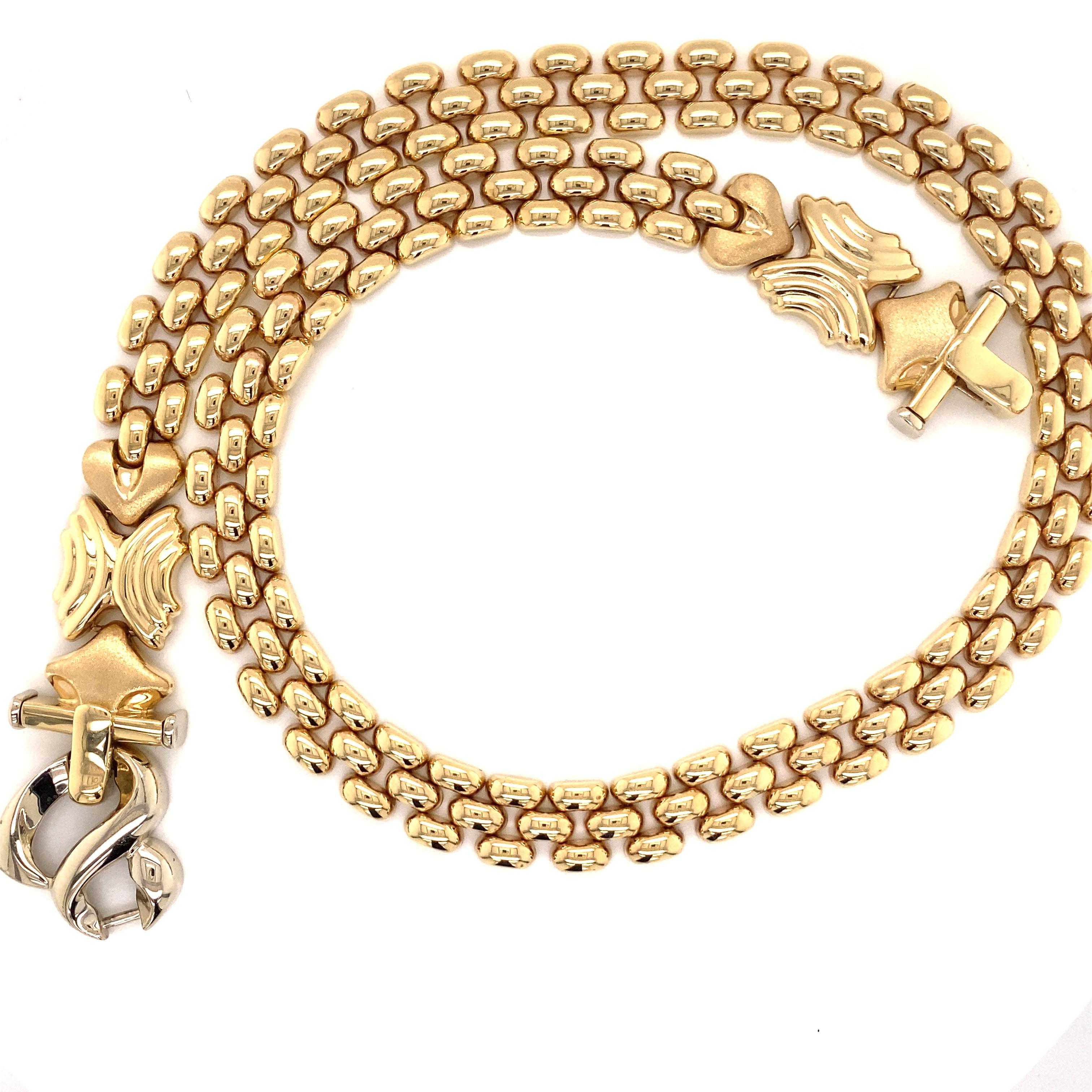 Vintage 1990's 14K Yellow Gold Italian Panther Link Necklace - Die italienische Halskette verfügt über einen Statement-Verschluss, der sowohl auf der Vorder- als auch auf der Rückseite getragen werden kann. Das 3-reihige Pantherglied ist 10 mm