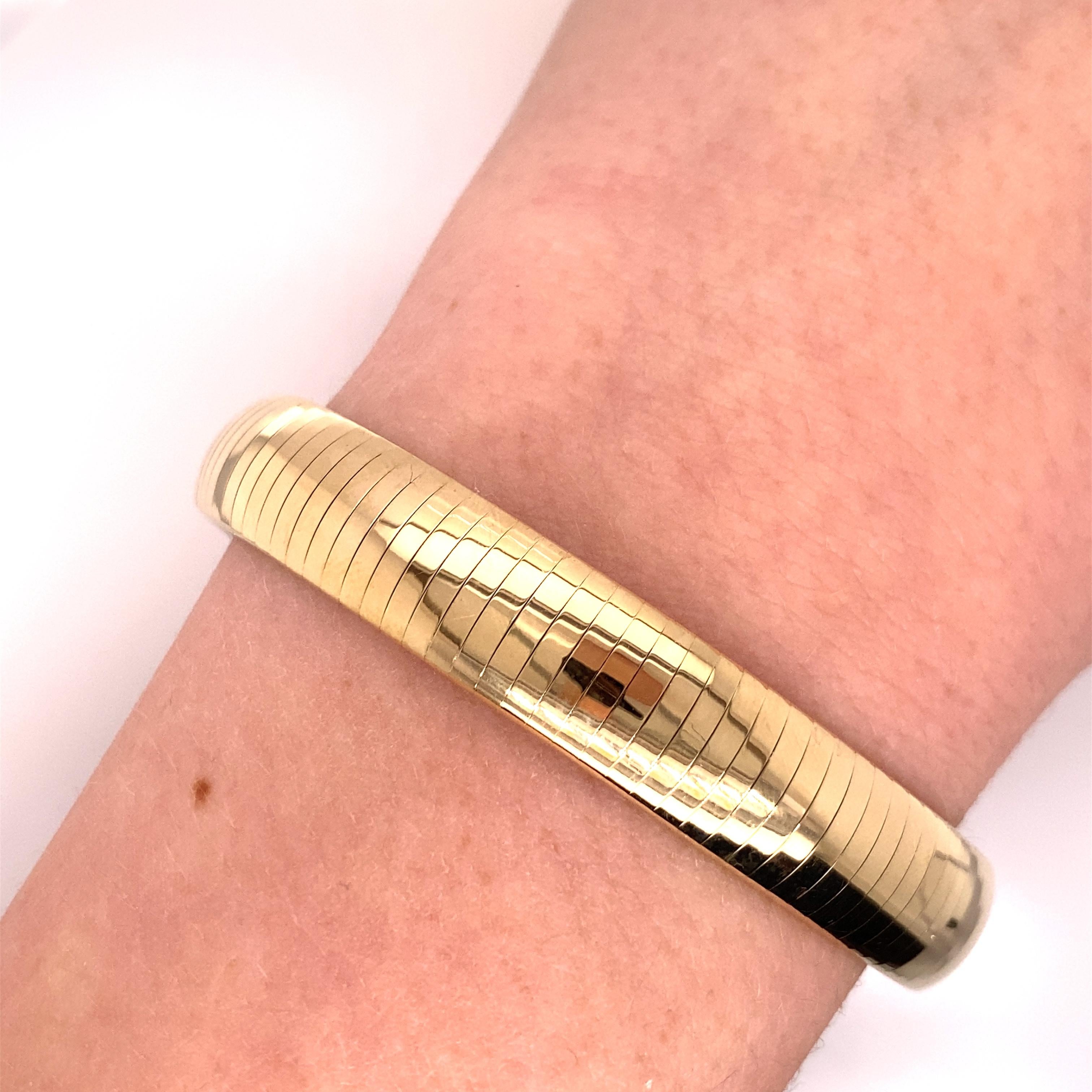 Bracelet Omega en or jaune 14 carats des années 1990 - Ce bracelet de fabrication italienne mesure 3/8