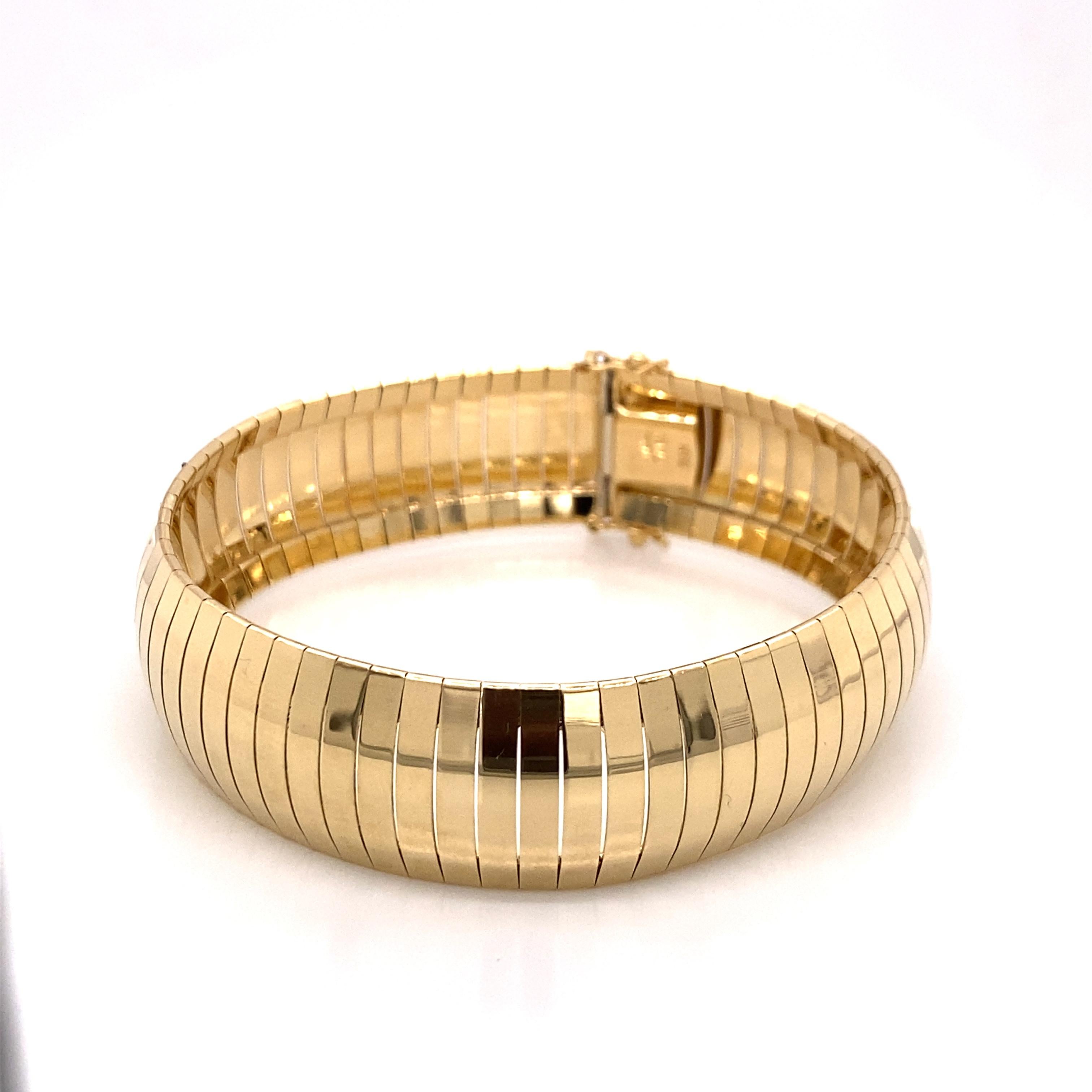 Moderne Bracelet Omega vintage en or jaune 14 carats, années 1990 en vente