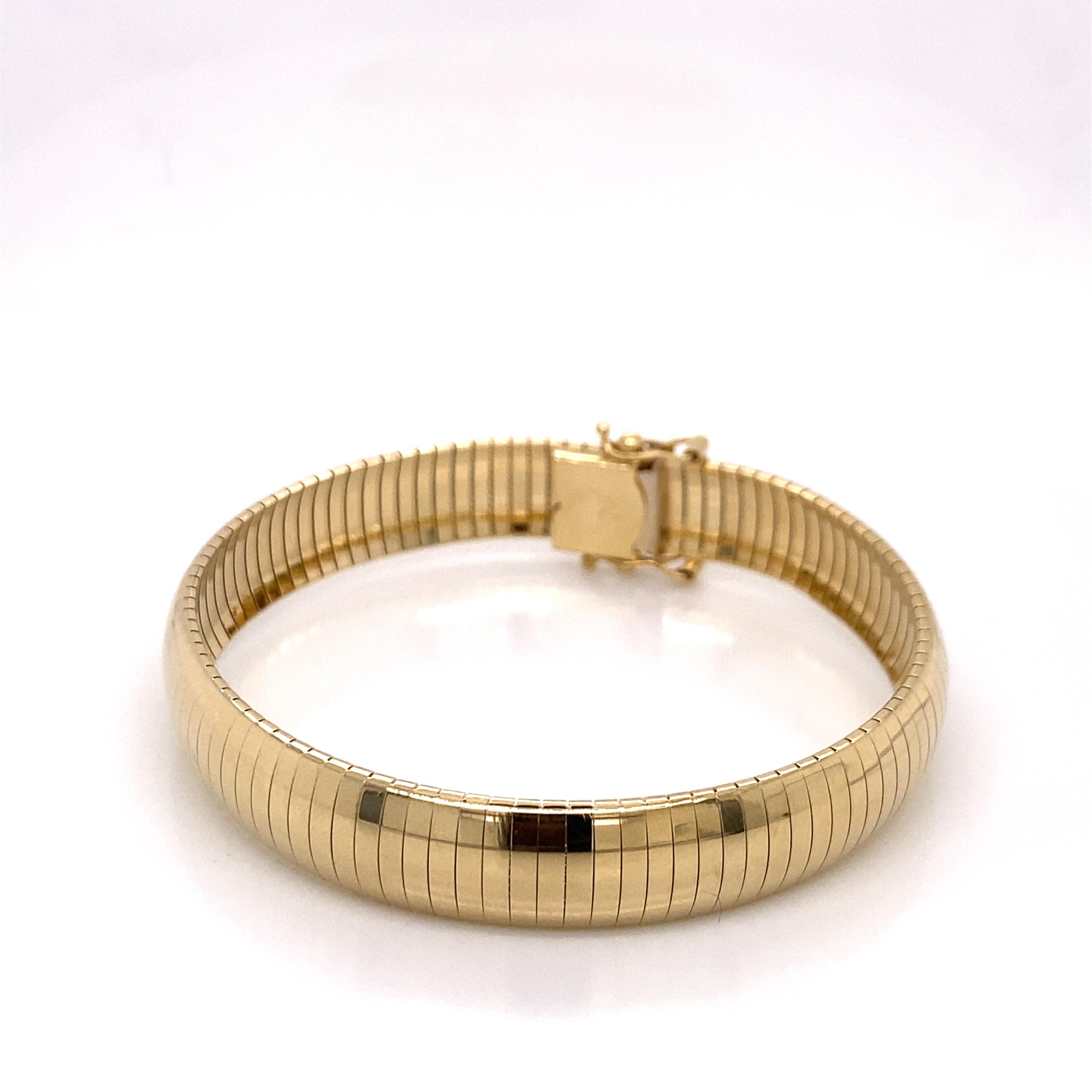 Moderne Bracelet Omega vintage en or jaune 14 carats, années 1990 en vente